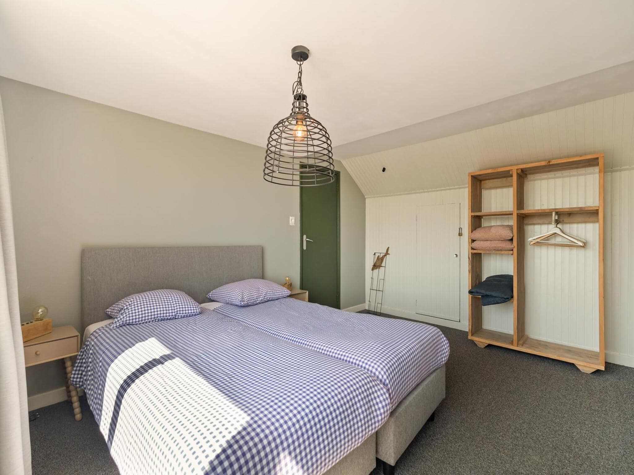 Een slaapkamer van Villa Zuidwester in Callantsoog