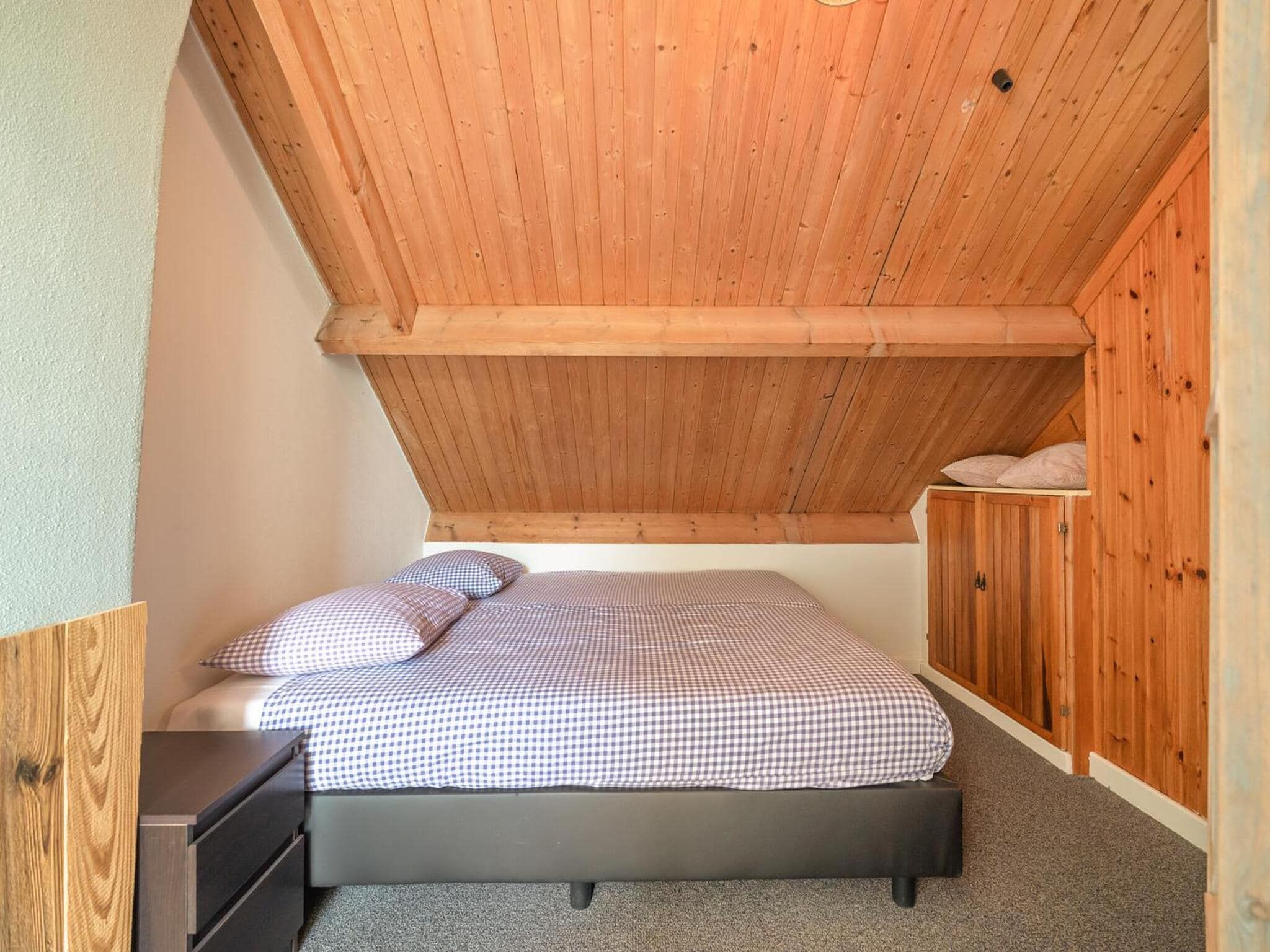 Een slaapkamer van Villa Zuidwester in Callantsoog