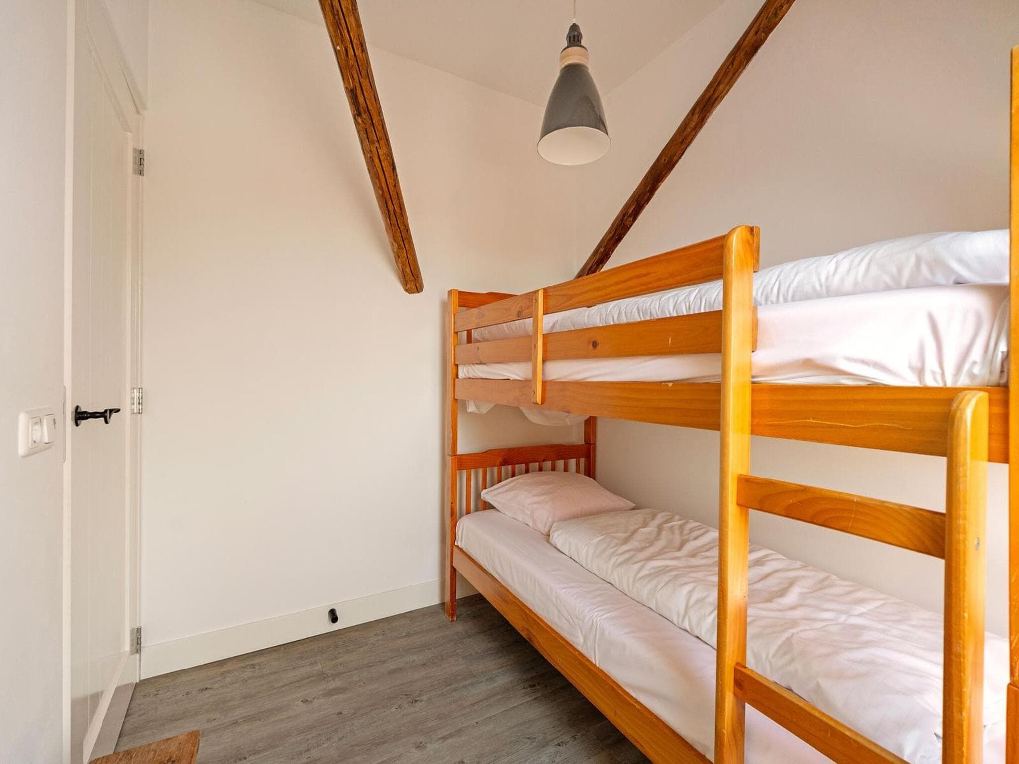 Een slaapkamer van Vossehoeck 2 in Callantsoog