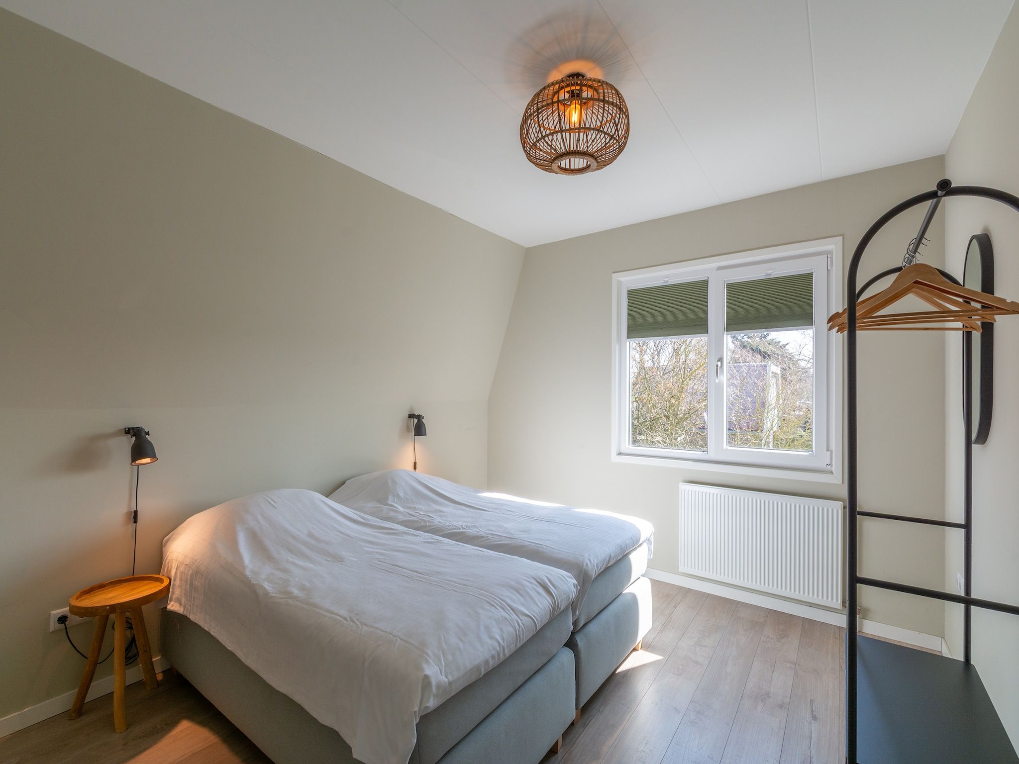 Een slaapkamer van Garnekuul 6 in Callantsoog