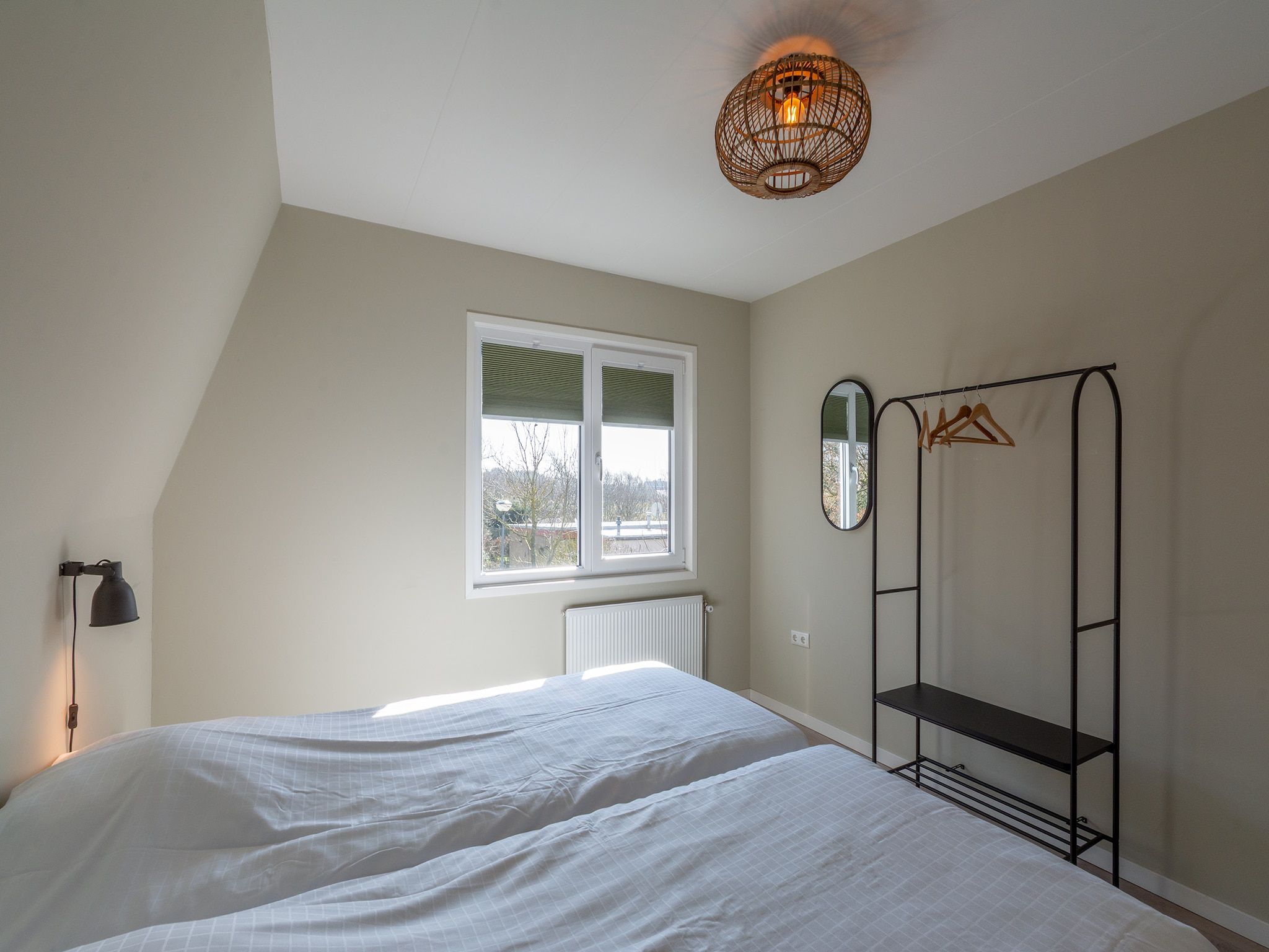 Een slaapkamer van Garnekuul 6 in Callantsoog