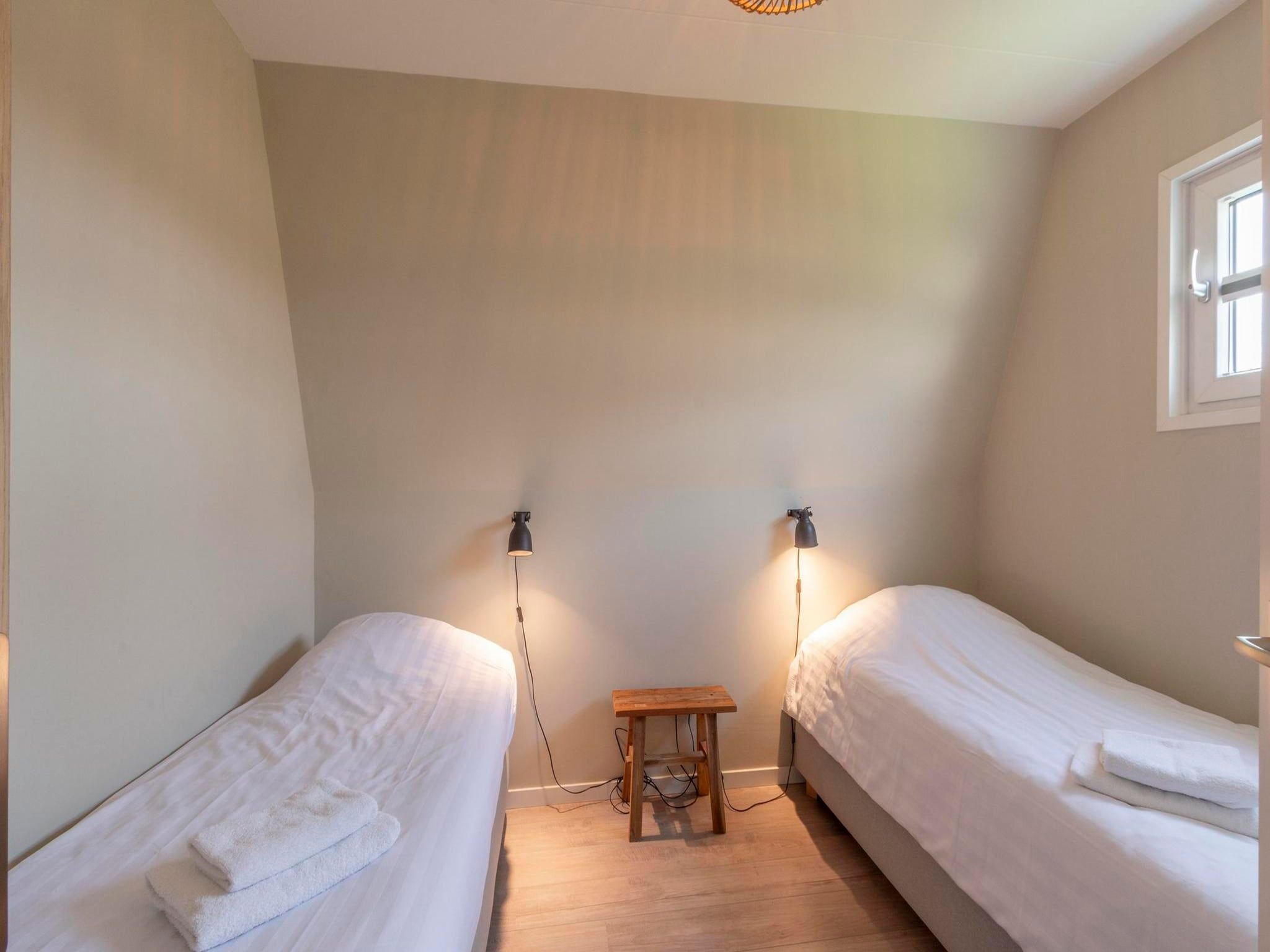 Een slaapkamer van Garnekuul 6 in Callantsoog