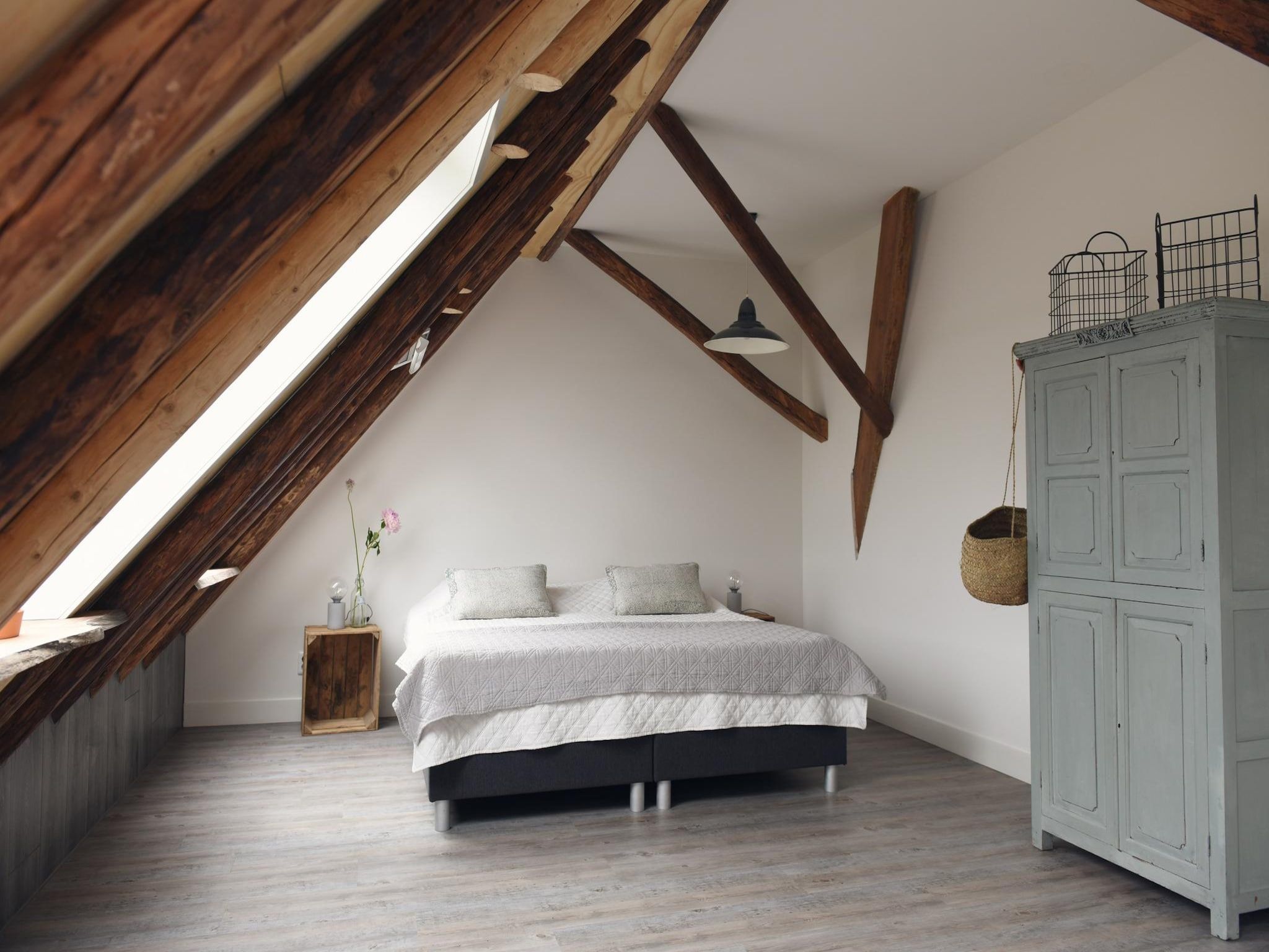 Een slaapkamer van Hoeve Landzicht in Callantsoog