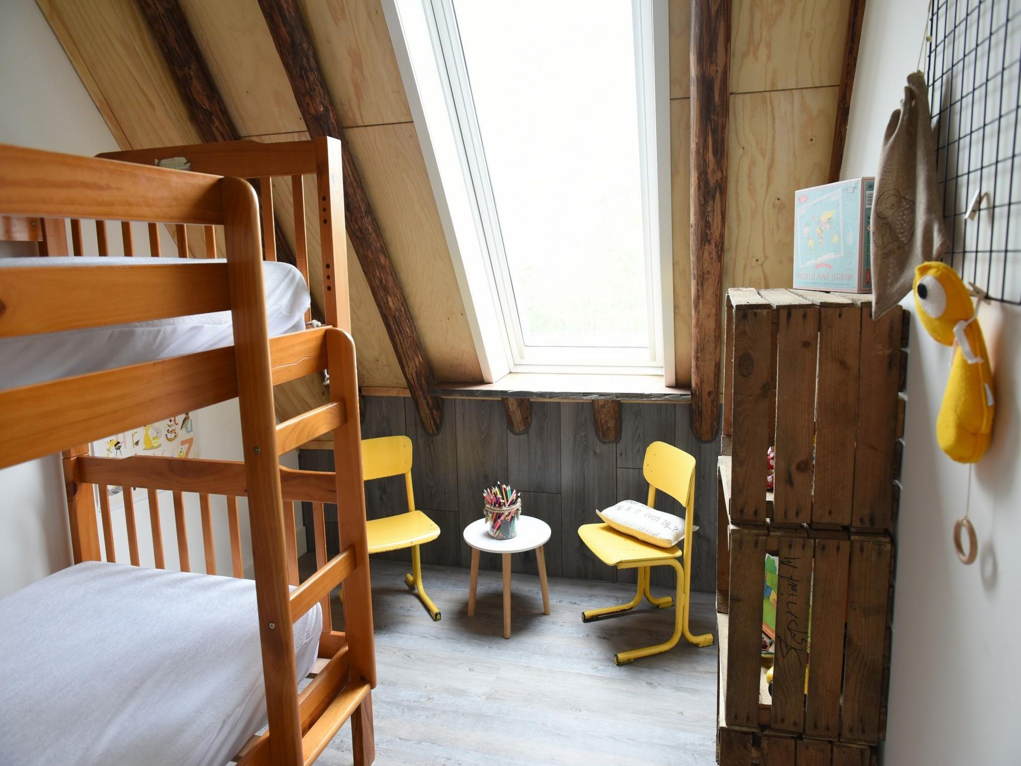 Een slaapkamer van Hoeve Landzicht in Callantsoog