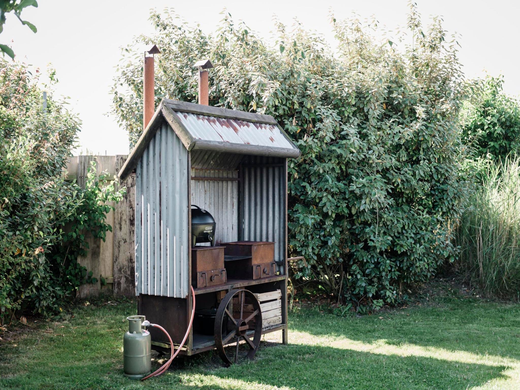 De tuin van Wood Lodge Luxe - Duynpark in Callantsoog