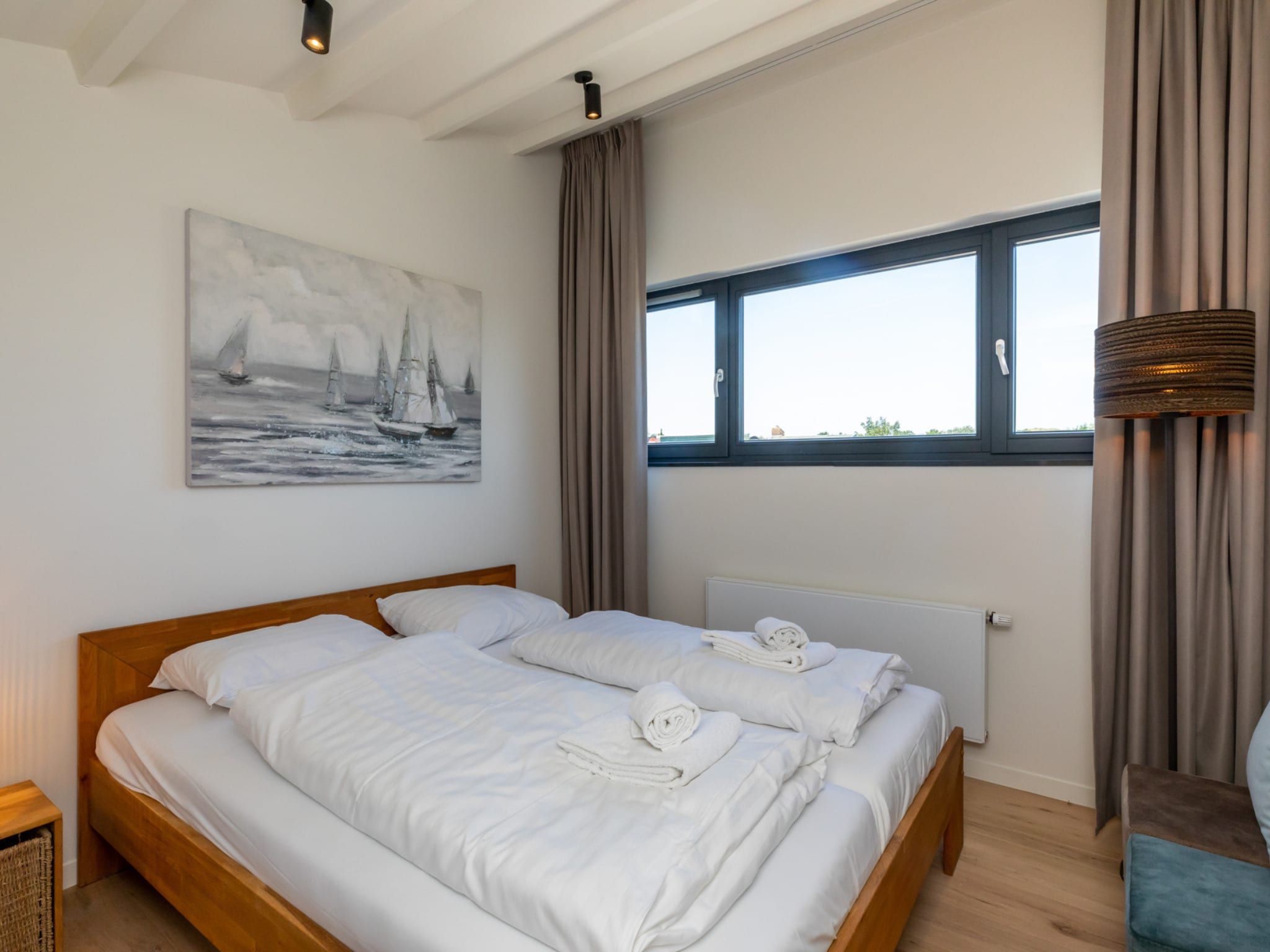 Een slaapkamer van Lepelblad 42 en 44  Nieuwvliet-Bad in Nieuwvliet-Bad