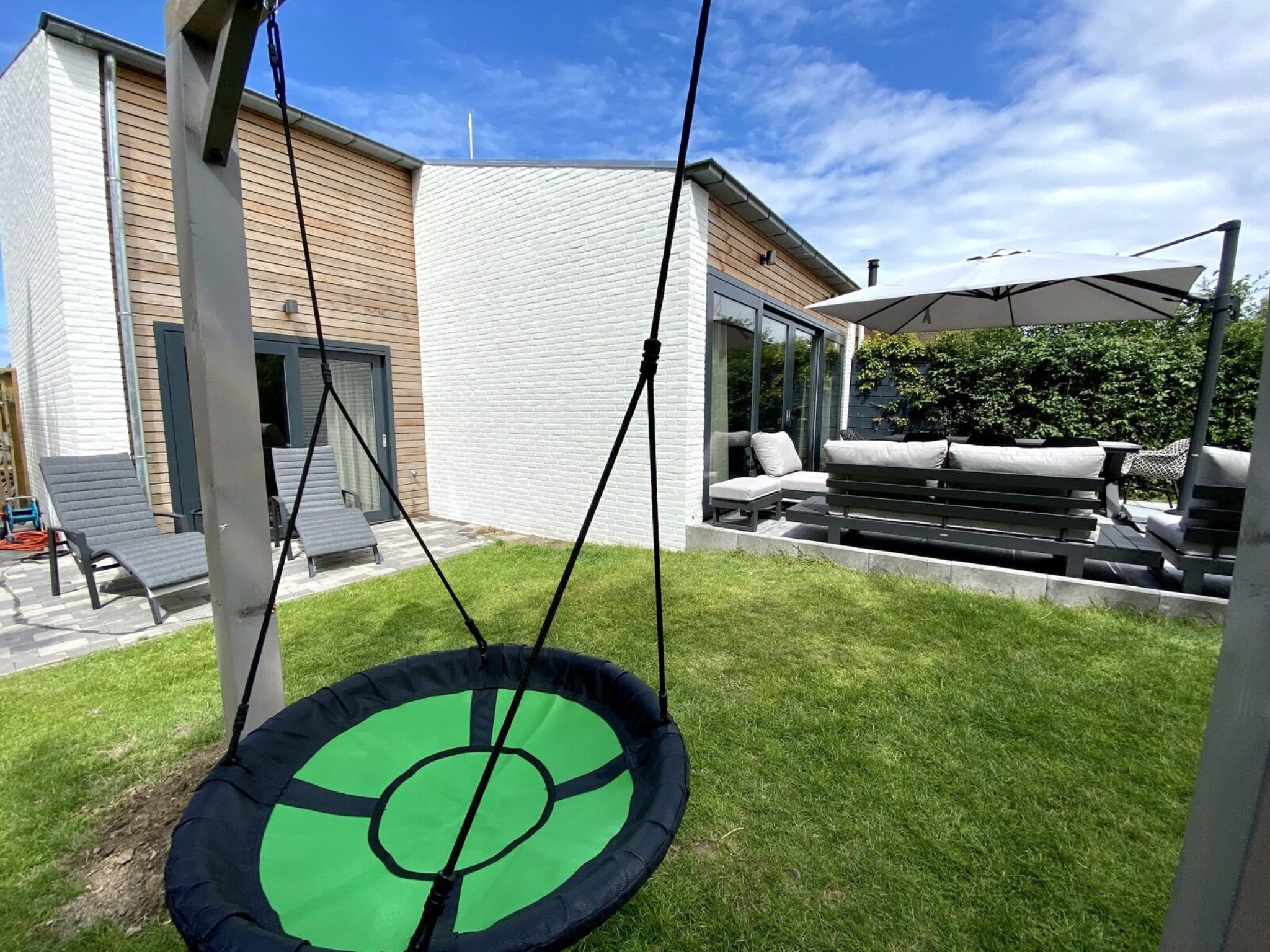 De tuin van Lepelblad 42 en 44  Nieuwvliet-Bad in Nieuwvliet-Bad