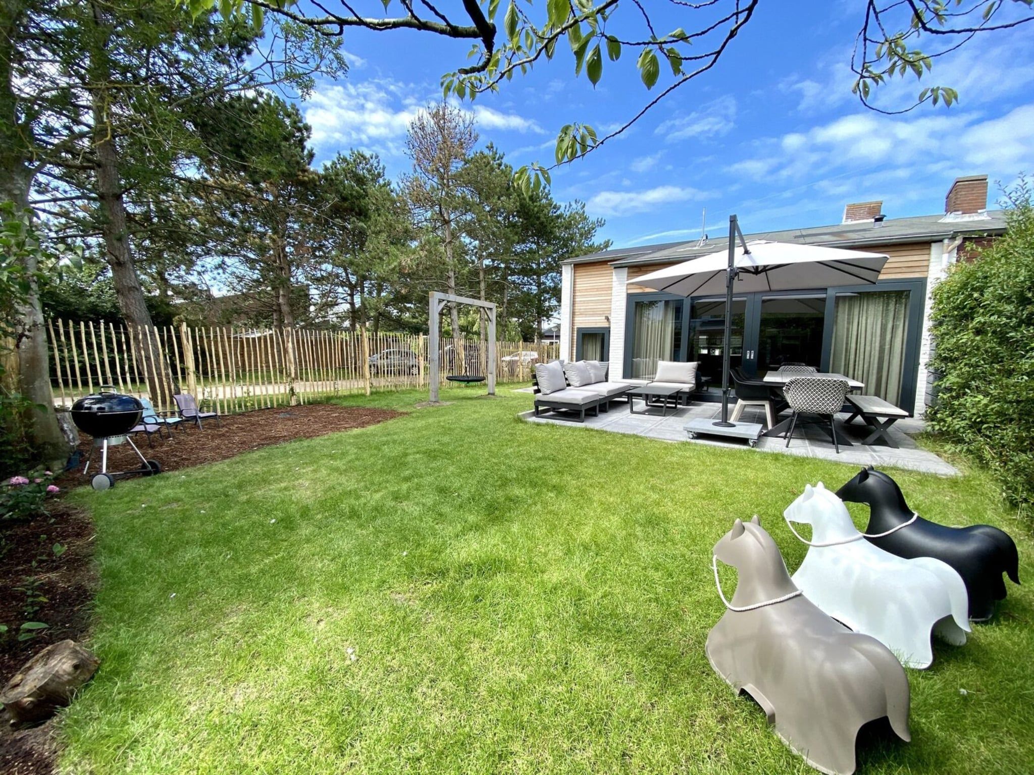 De tuin van Lepelblad 42 en 44  Nieuwvliet-Bad in Nieuwvliet-Bad