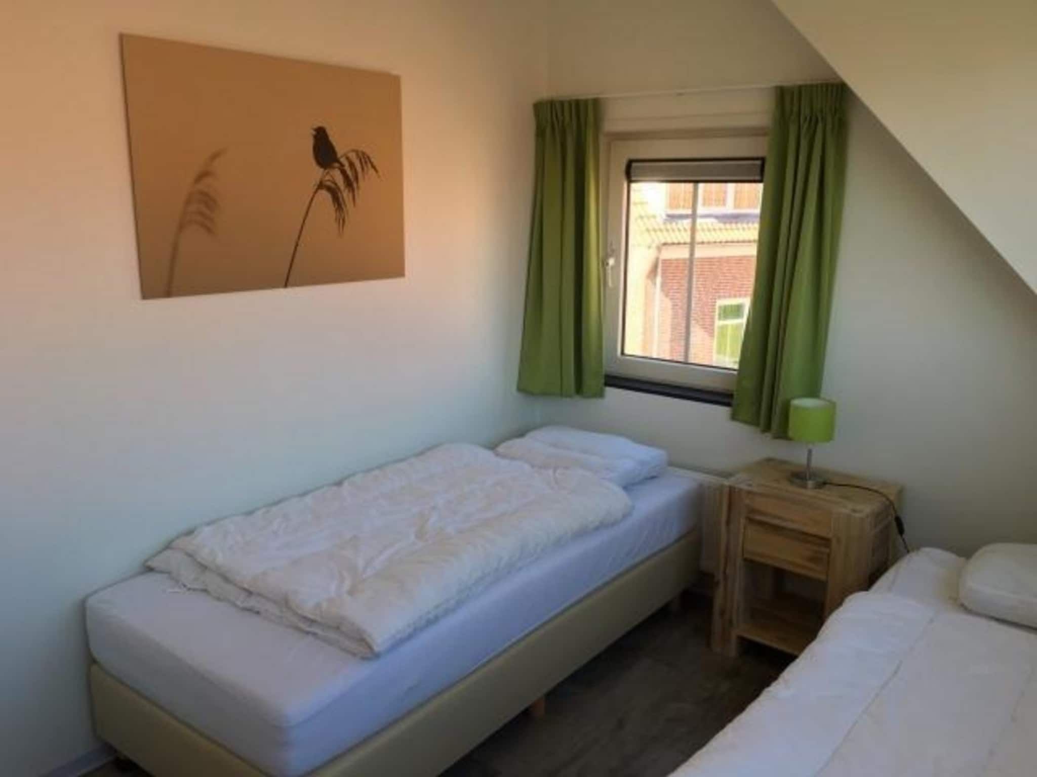 Een slaapkamer van Landgoed de Lente 12 Krokus Breskens in Breskens