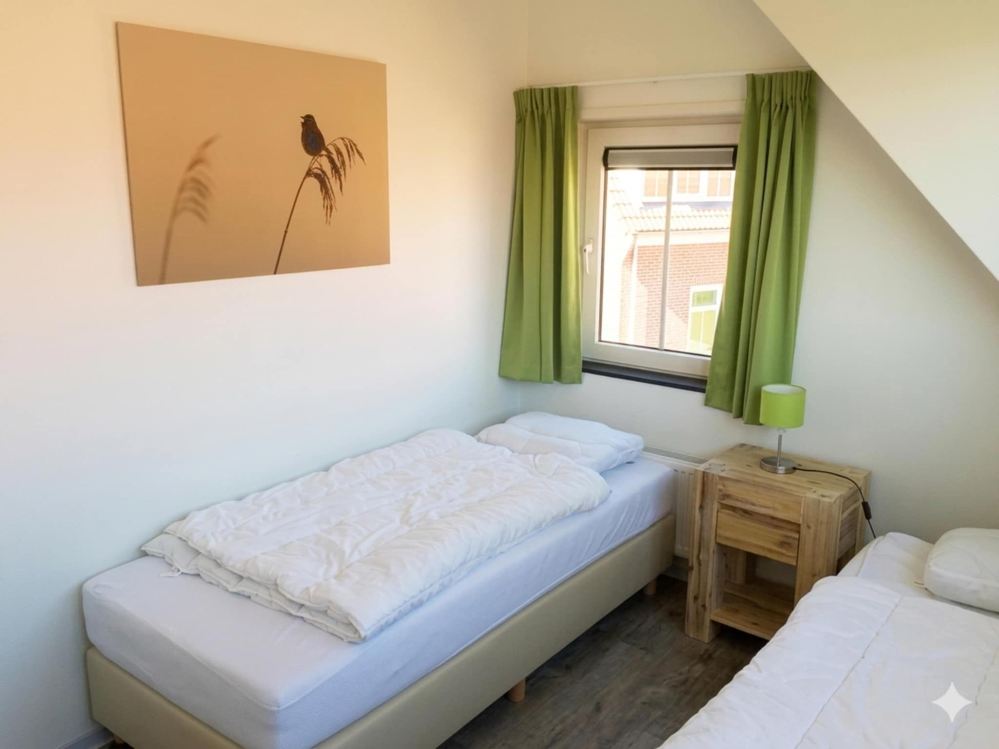 Een slaapkamer van Landgoed de Lente 12 Krokus Breskens in Breskens