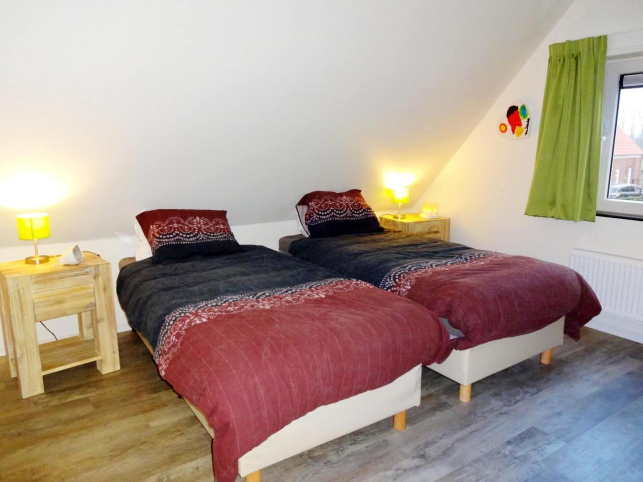 Een slaapkamer van Landgoed de Lente 34 Krokus Breskens in Breskens