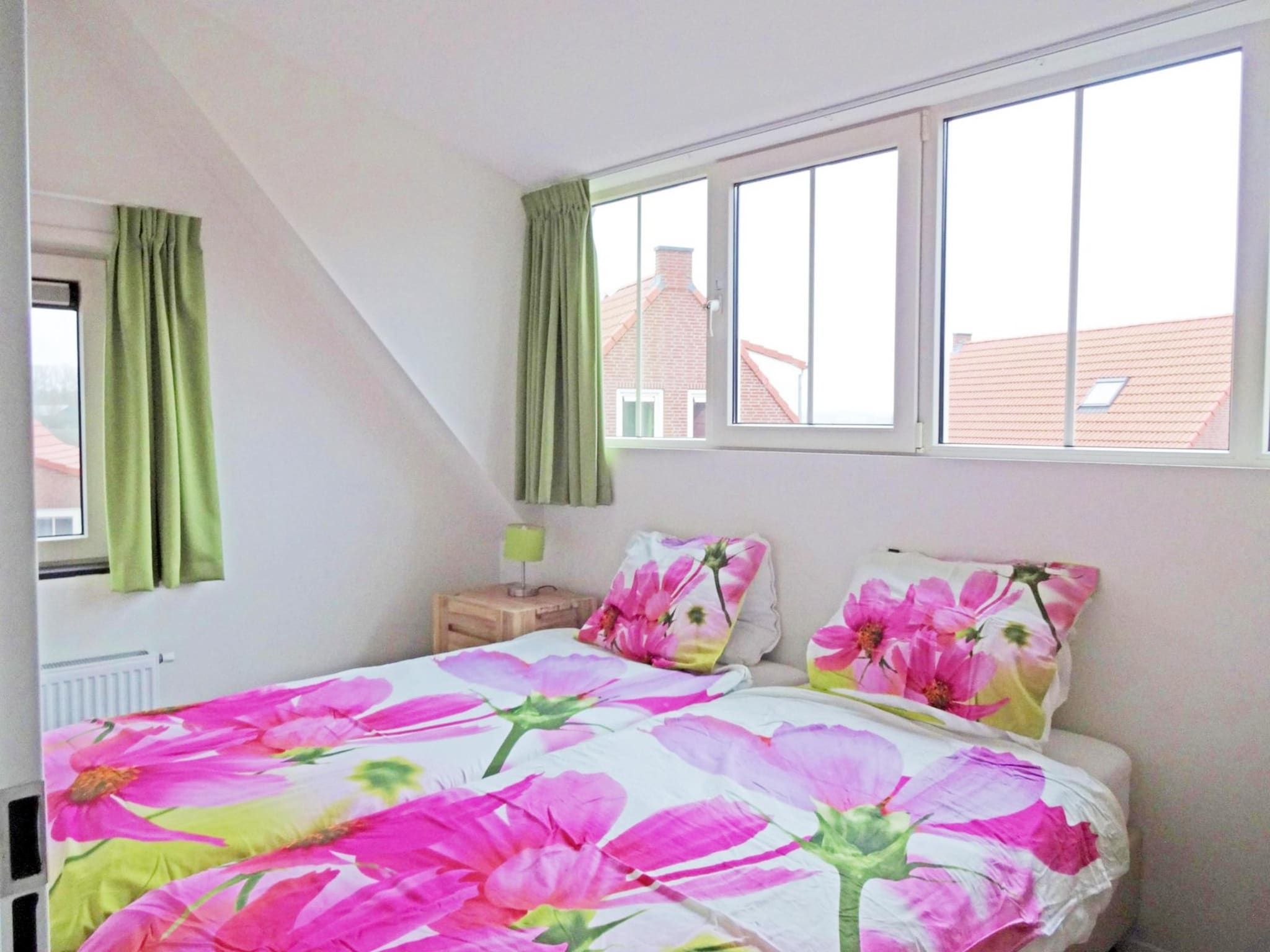 Een slaapkamer van Landgoed de Lente 34 Krokus Breskens in Breskens