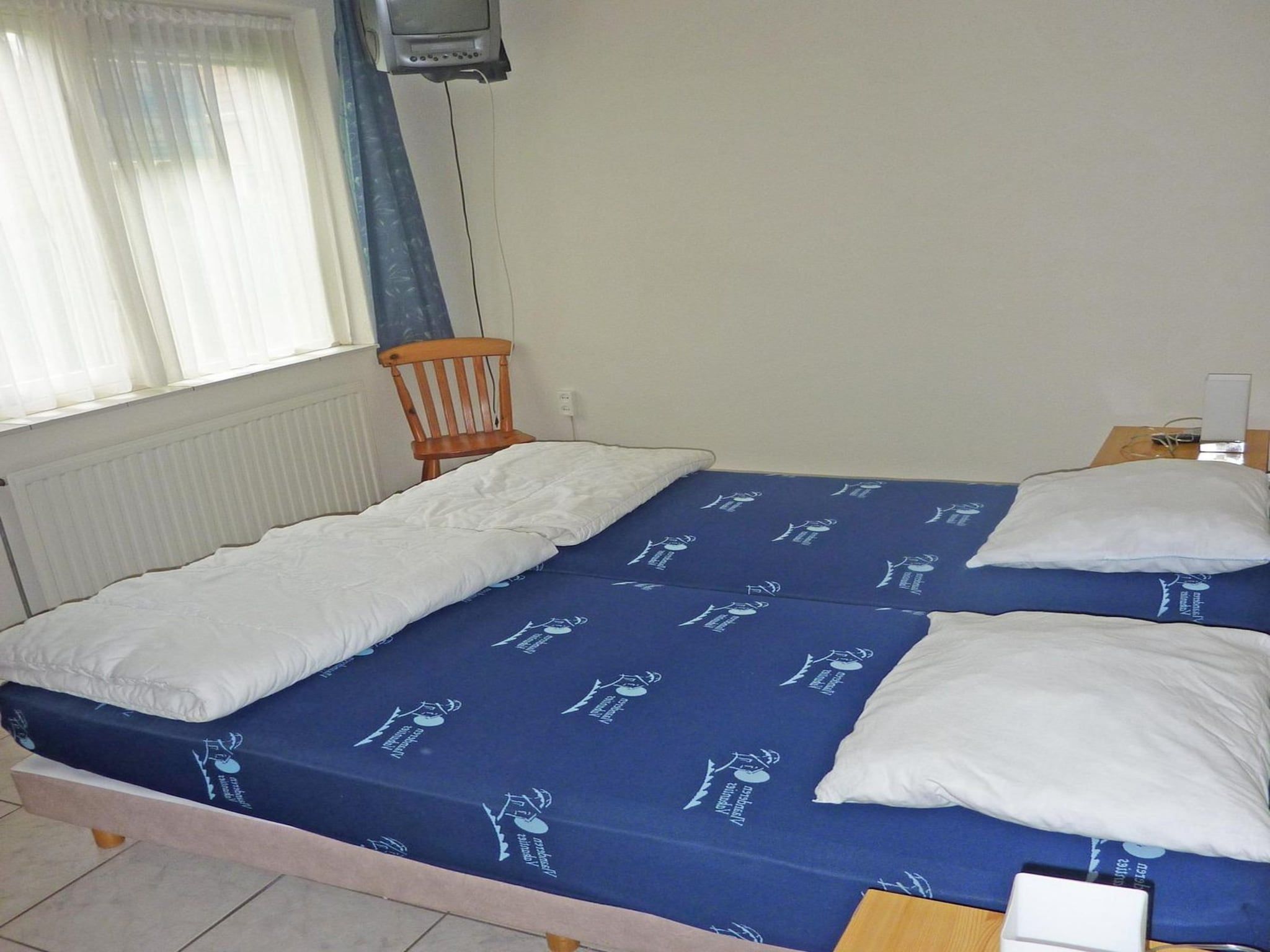 Een slaapkamer van Scheldeveste 97 Schelde Breskens in Breskens