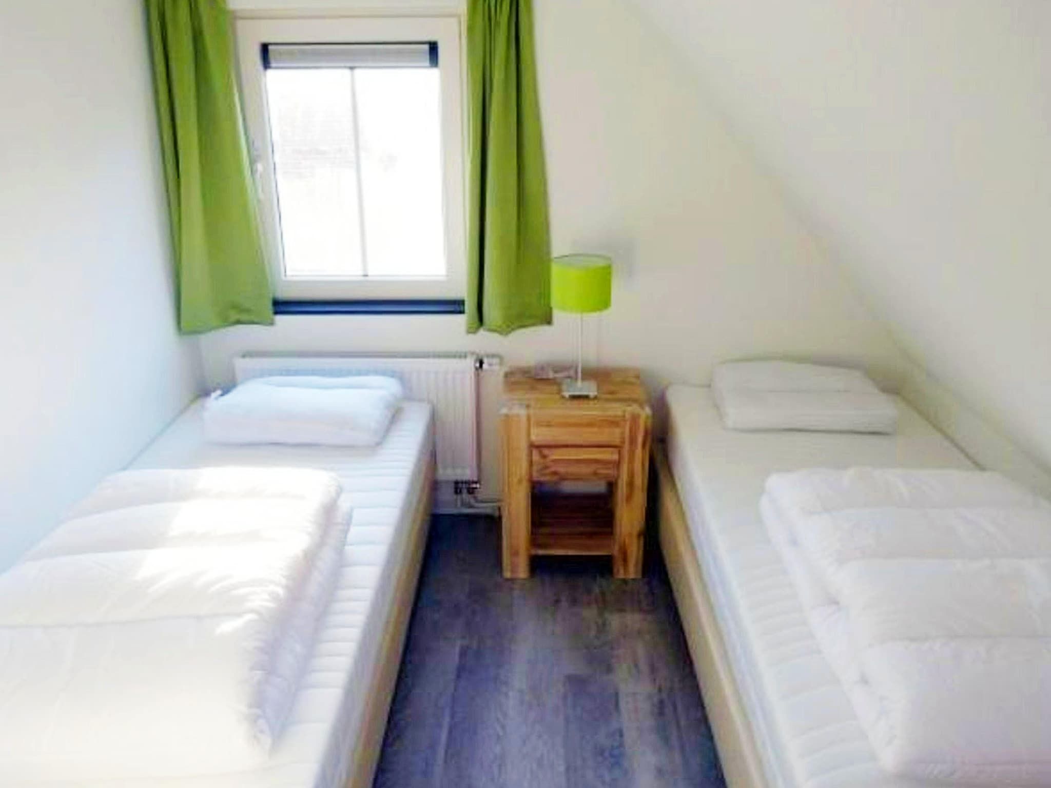 Een slaapkamer van Landgoed de Lente 40 Sneeuwklokje Breskens in Breskens