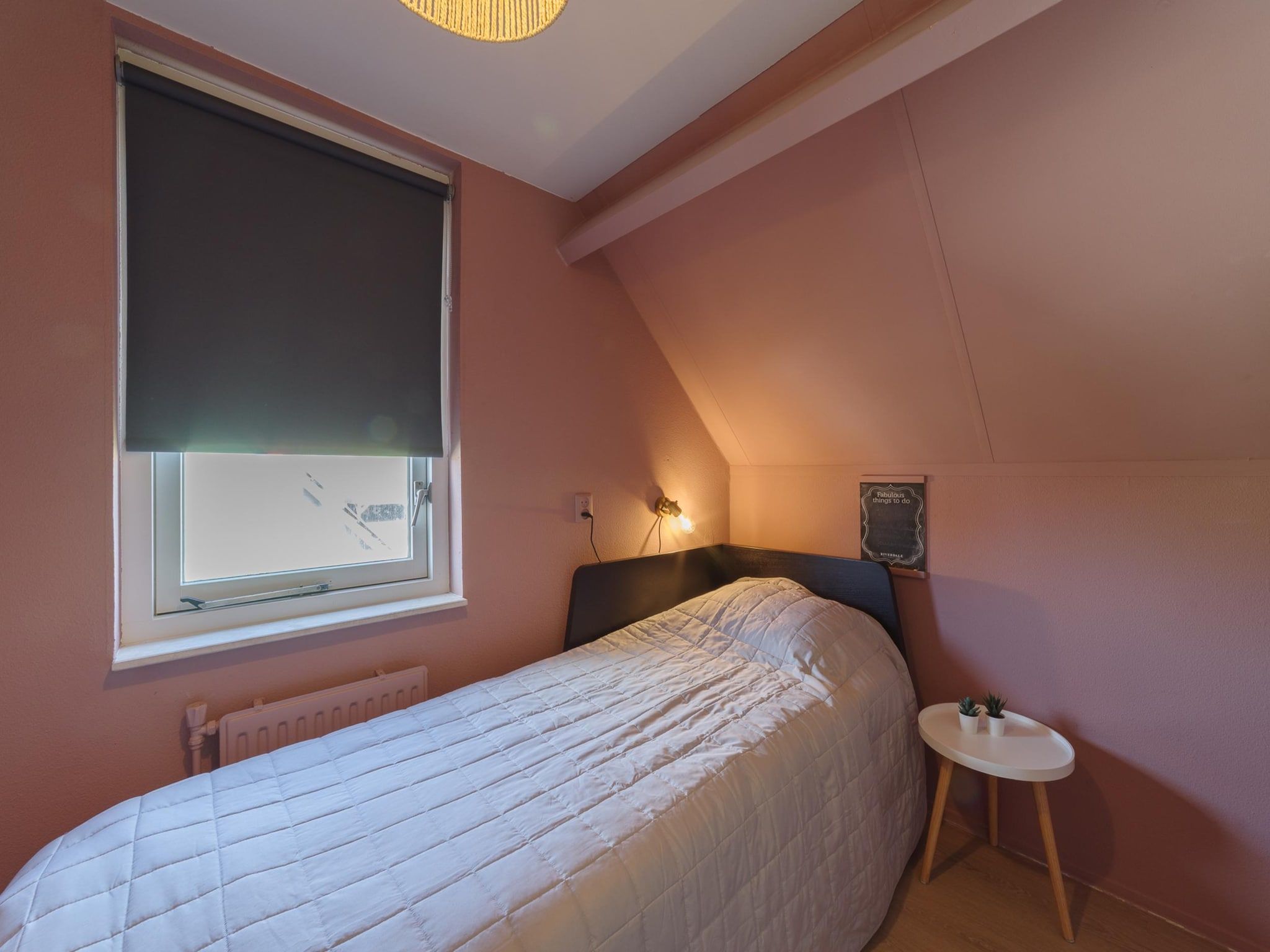 Een slaapkamer van Villapark De Oesterbaai 8 in Wemeldinge