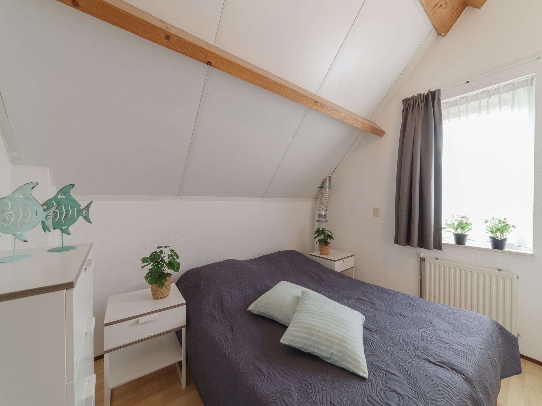 Een slaapkamer van Villapark De Oesterbaai 17 in Wemeldinge