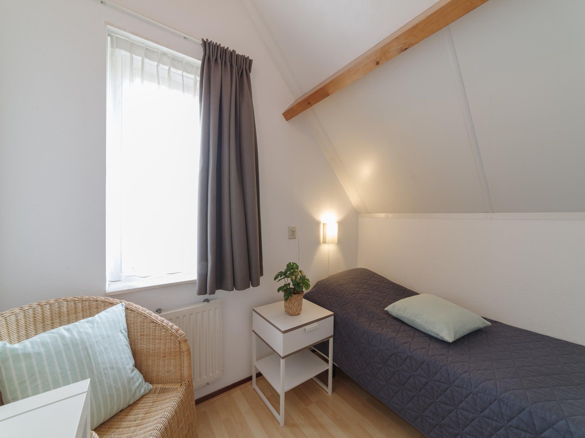 Een slaapkamer van Villapark De Oesterbaai 17 in Wemeldinge