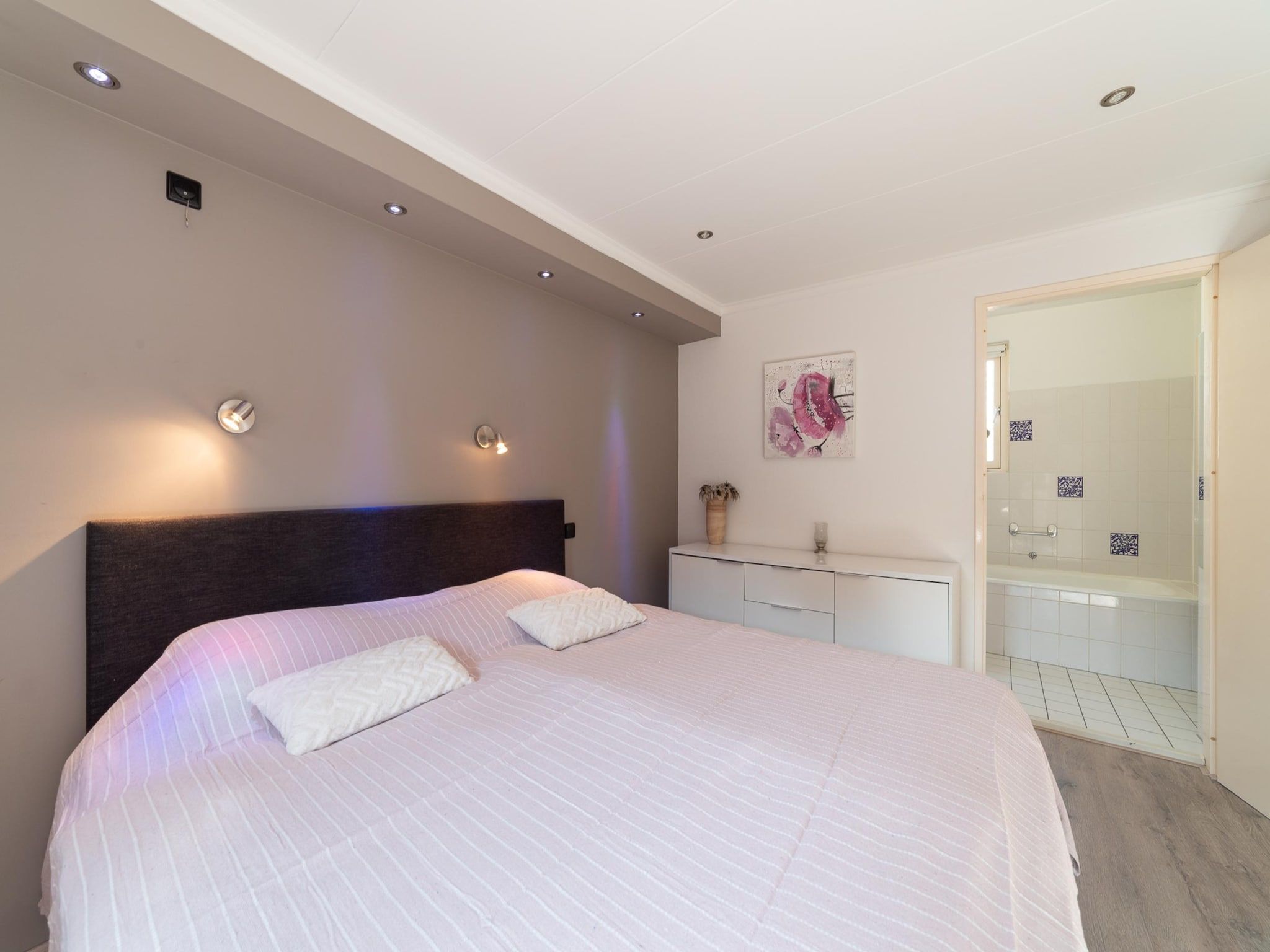 Een slaapkamer van Villapark De Oesterbaai 26 in Wemeldinge