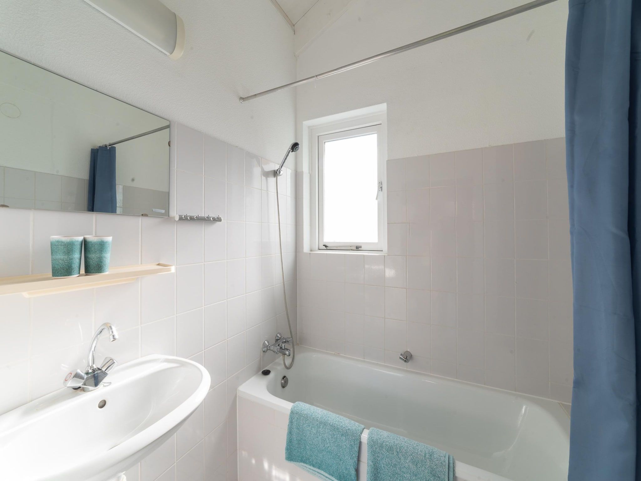 De badkamer van Villapark De Oesterbaai 31 in Wemeldinge