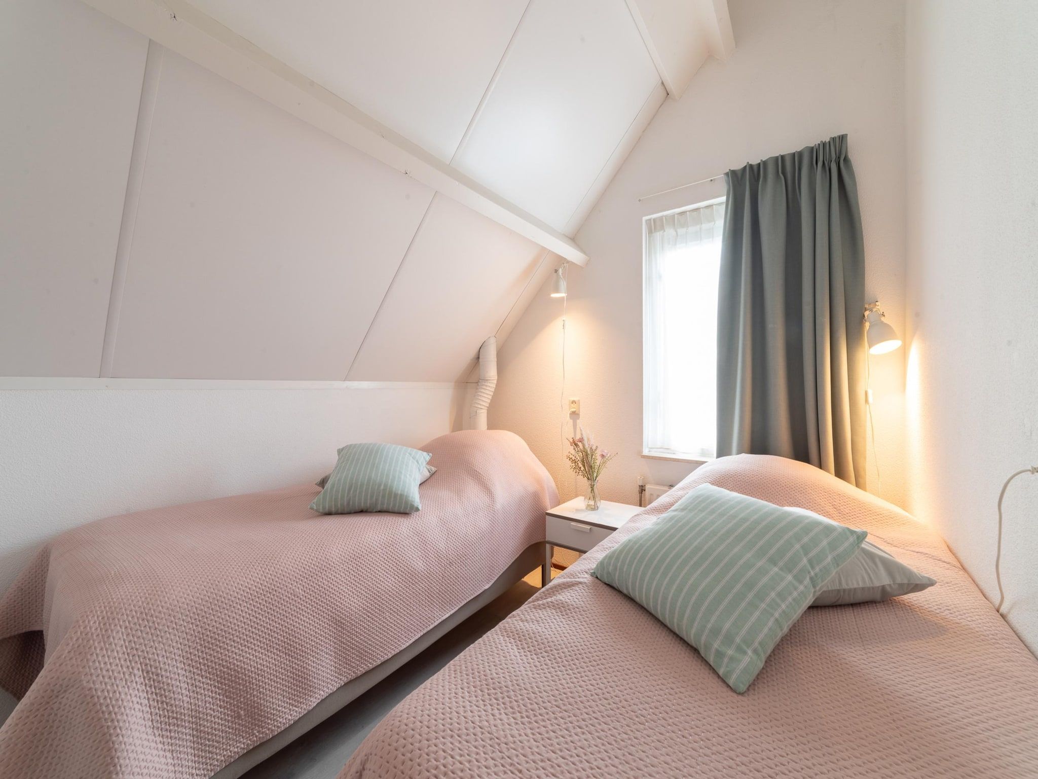 Een slaapkamer van Villapark De Oesterbaai 31 in Wemeldinge