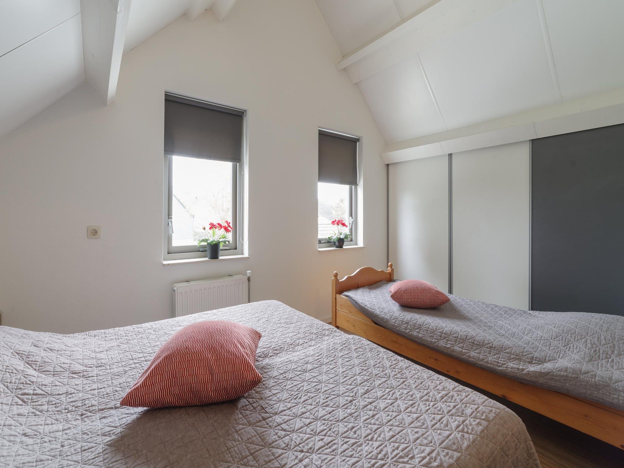 Een slaapkamer van Villapark De Oesterbaai 49 in Wemeldinge