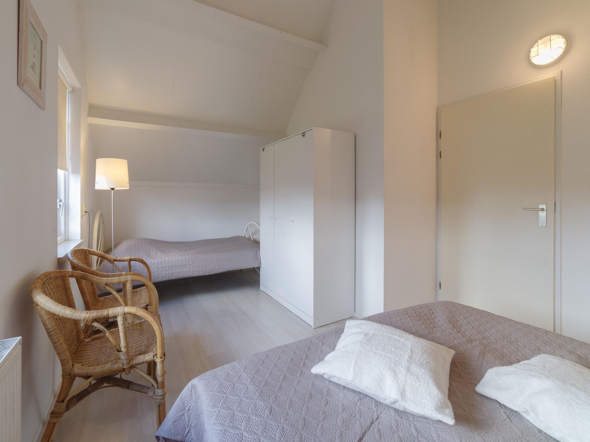 Een slaapkamer van Villapark De Oesterbaai 96 in Wemeldinge