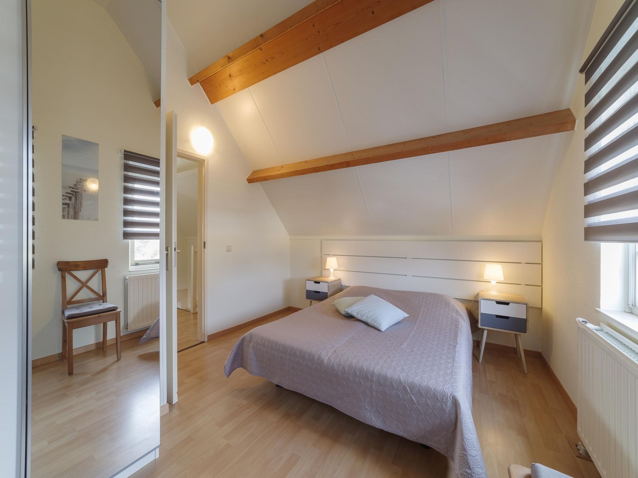 Een slaapkamer van Villapark De Oesterbaai 112 in Wemeldinge