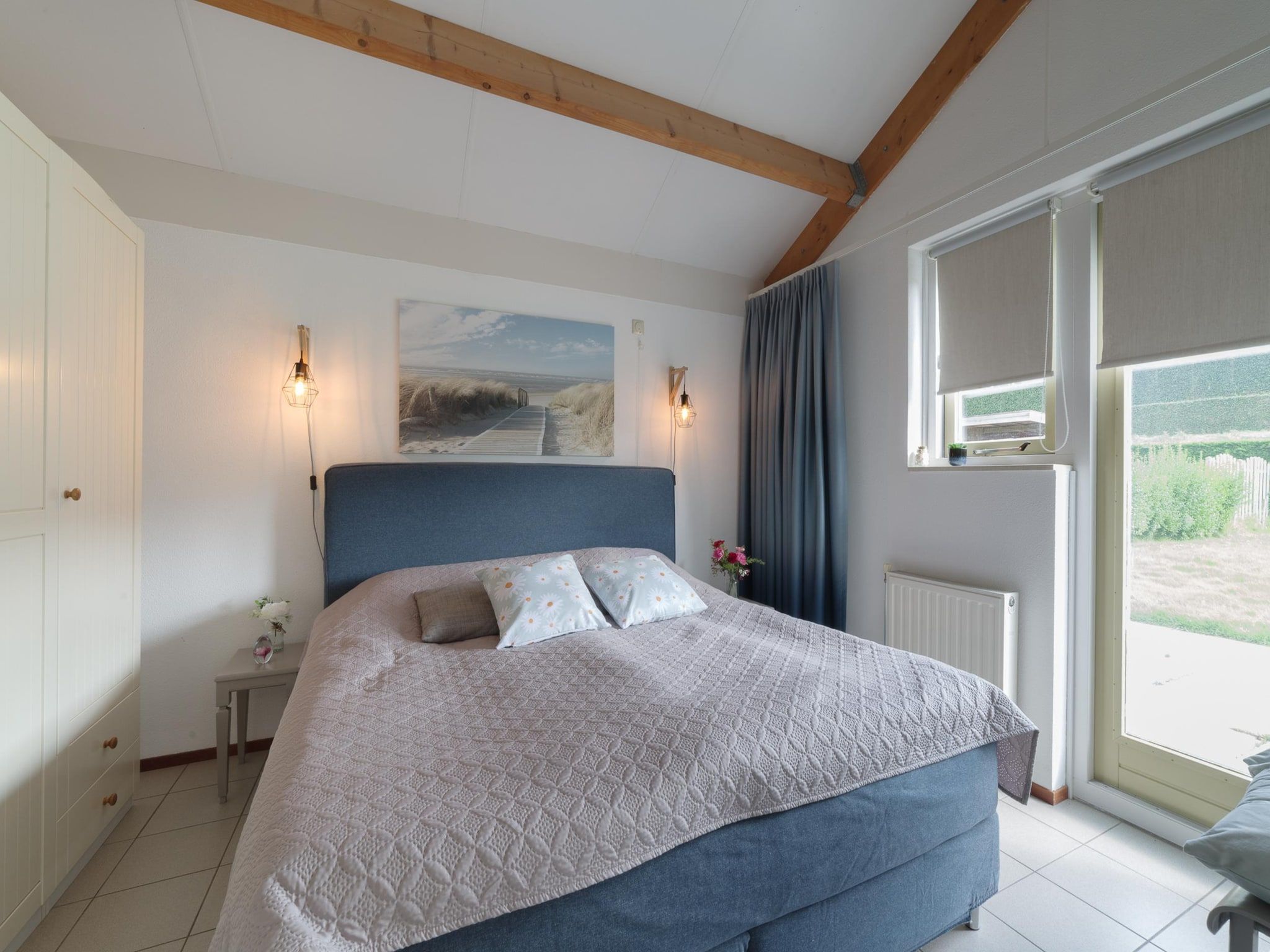 Een slaapkamer van Villapark De Oesterbaai 123 in Wemeldinge