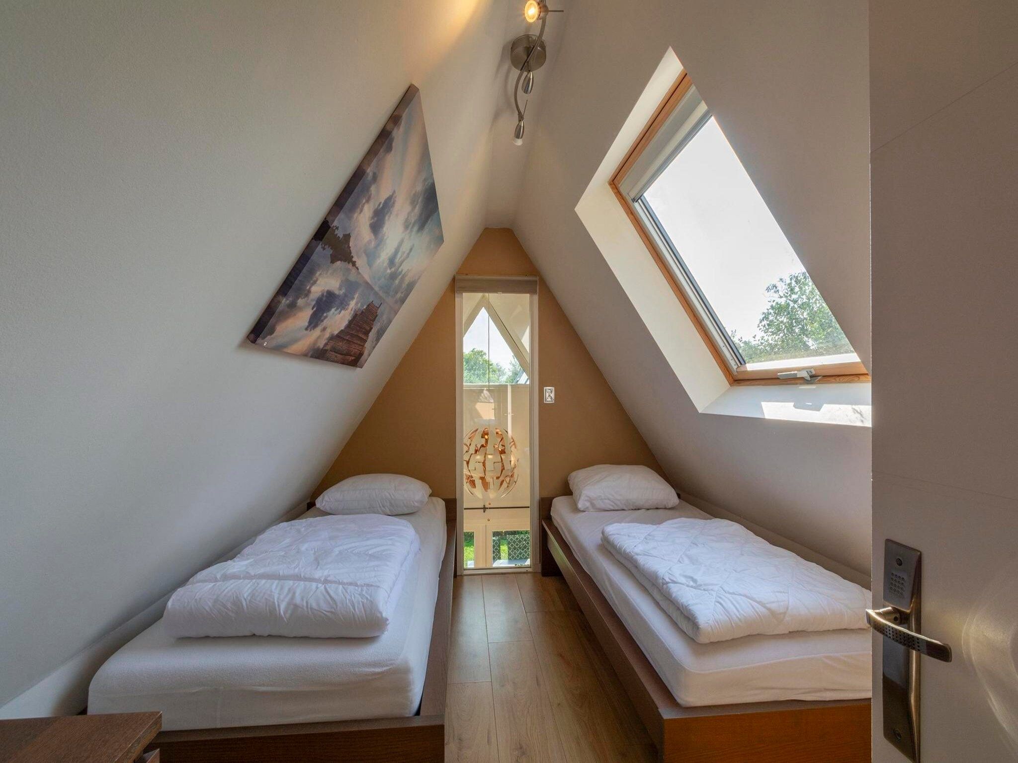 Een slaapkamer van Sandepark 118 in Groote Keeten