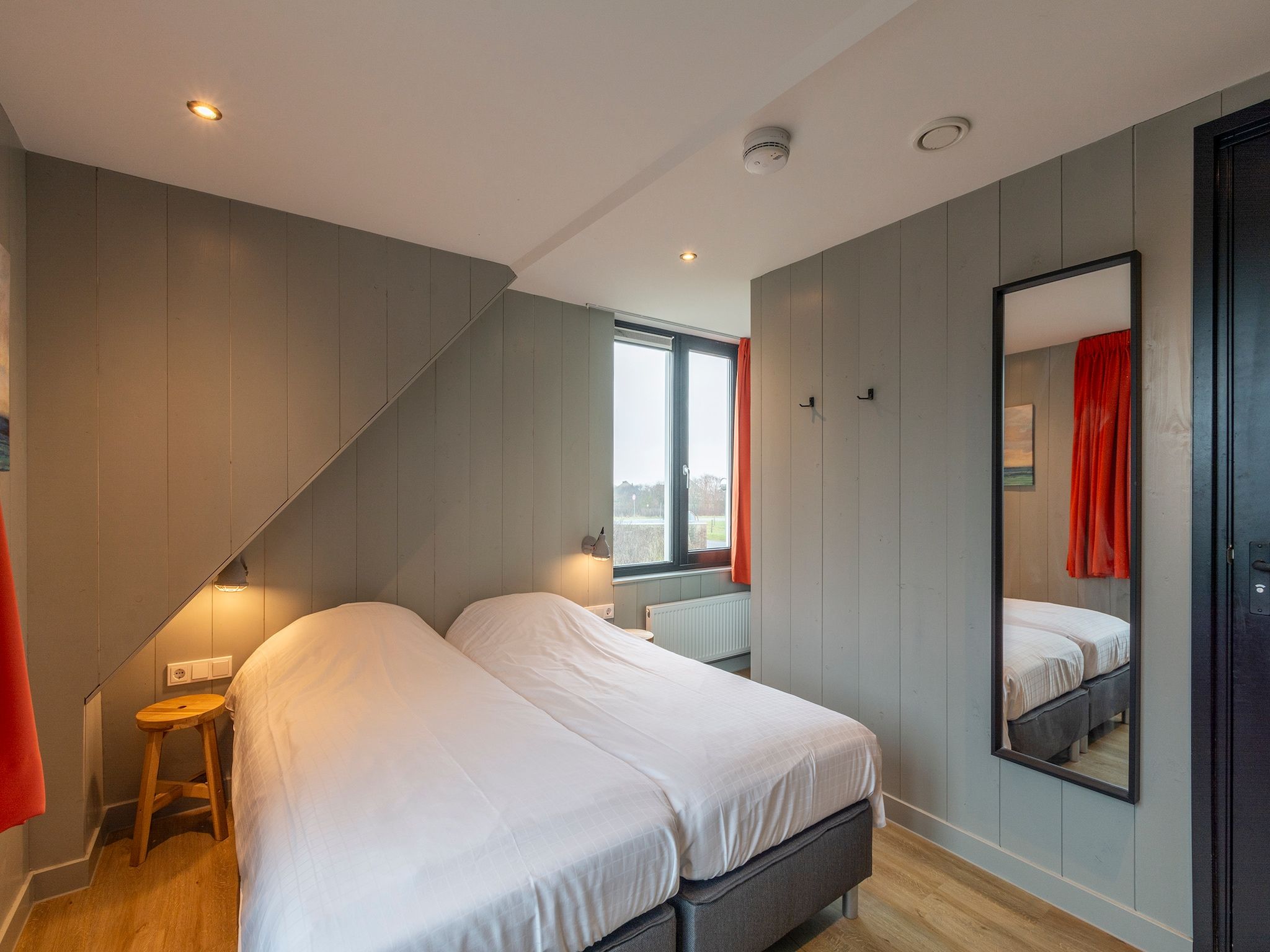 Een slaapkamer van Groote Kaap in Callantsoog