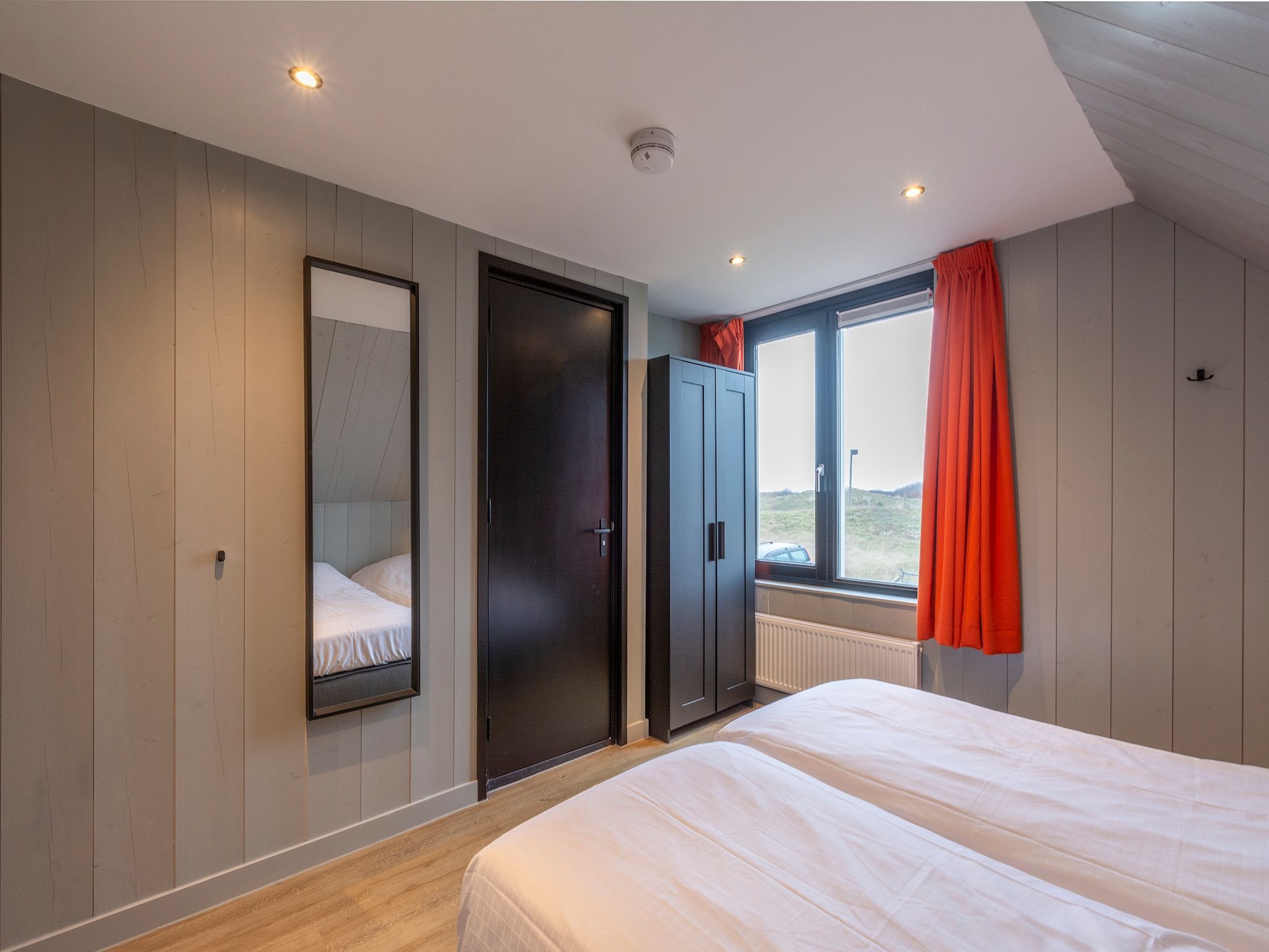 Een slaapkamer van Groote Kaap in Callantsoog