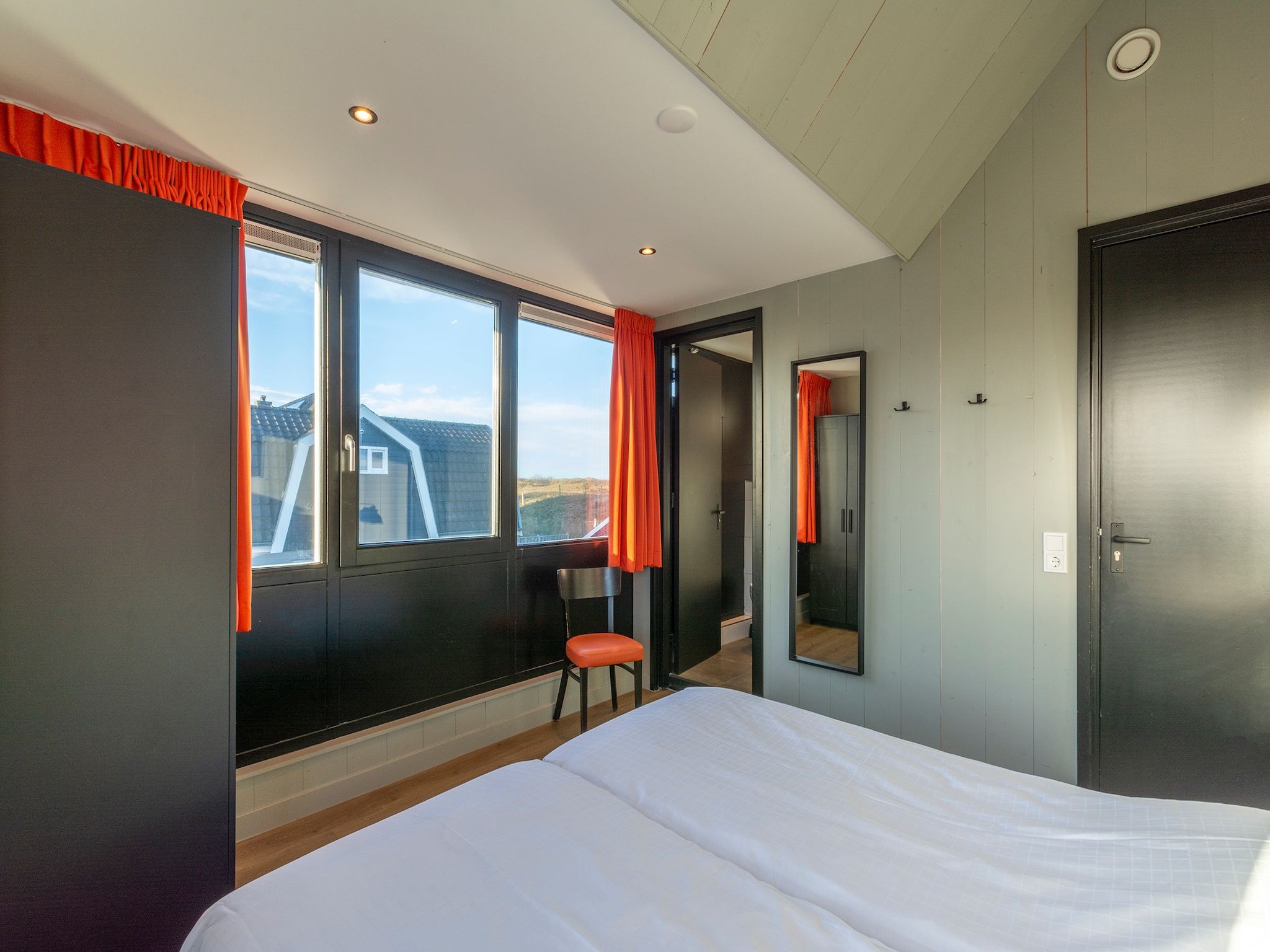 Een slaapkamer van Groote Kaap in Callantsoog