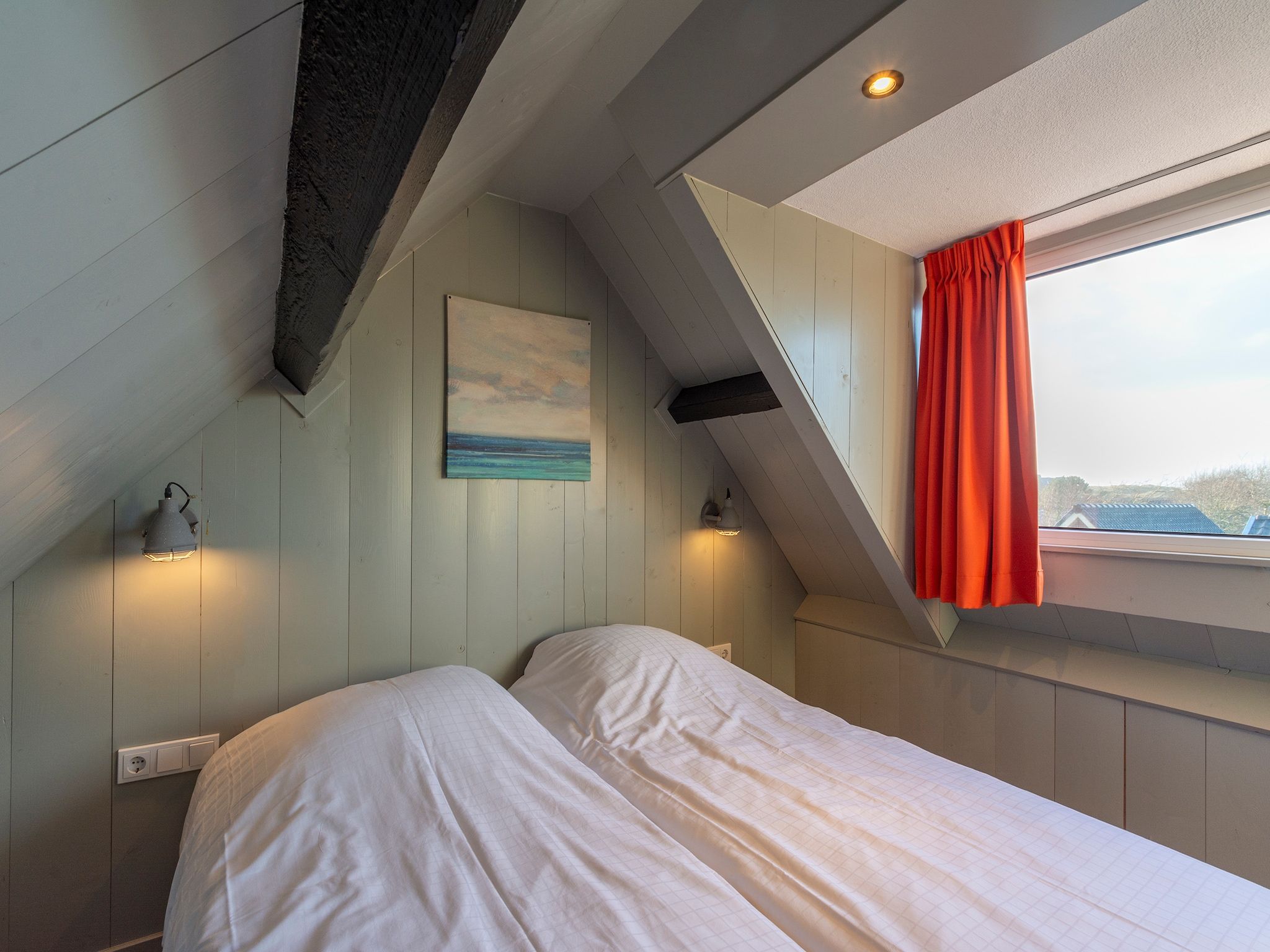 Een slaapkamer van Groote Kaap in Callantsoog