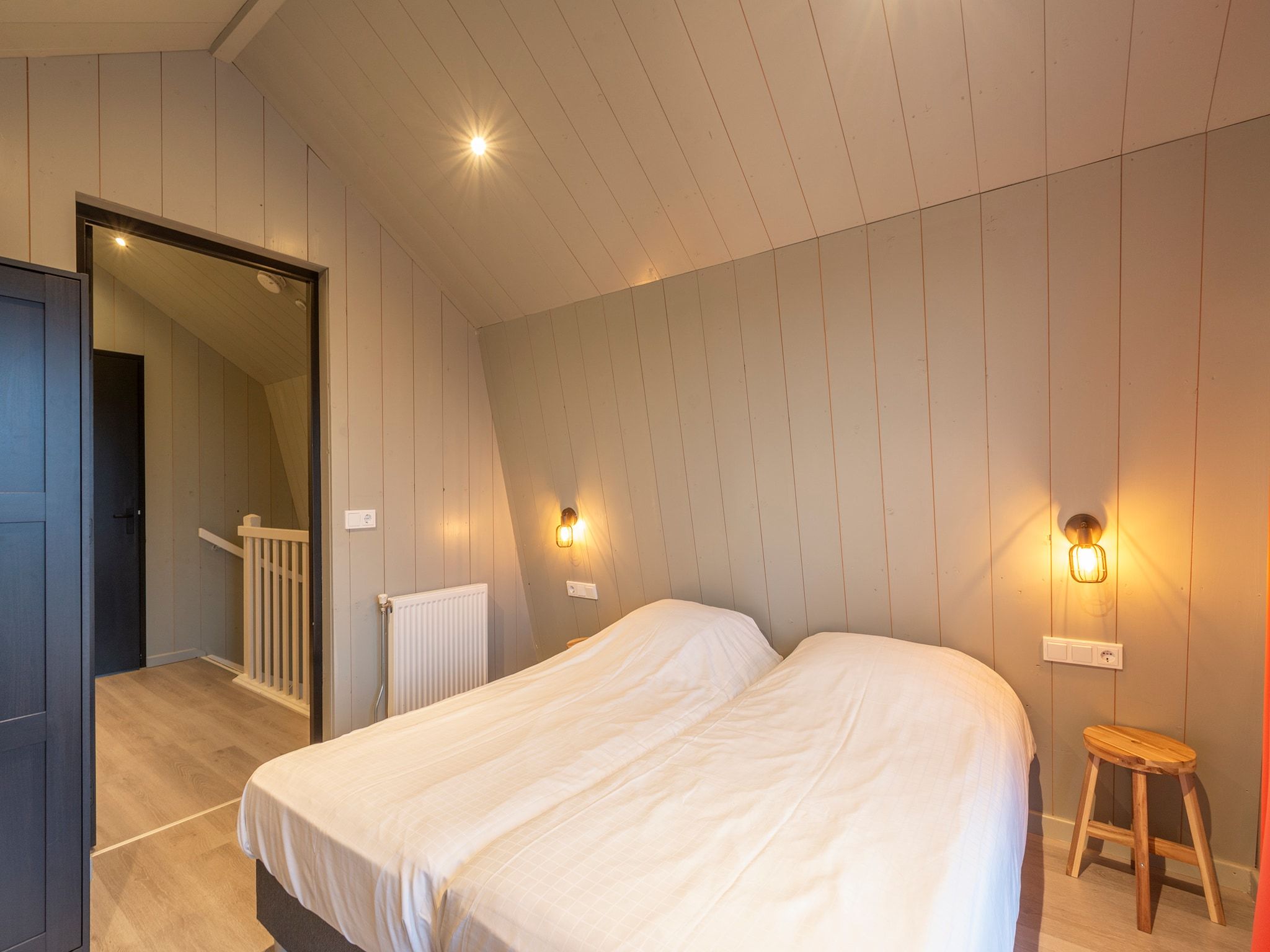 Een slaapkamer van Groote Kaap in Callantsoog