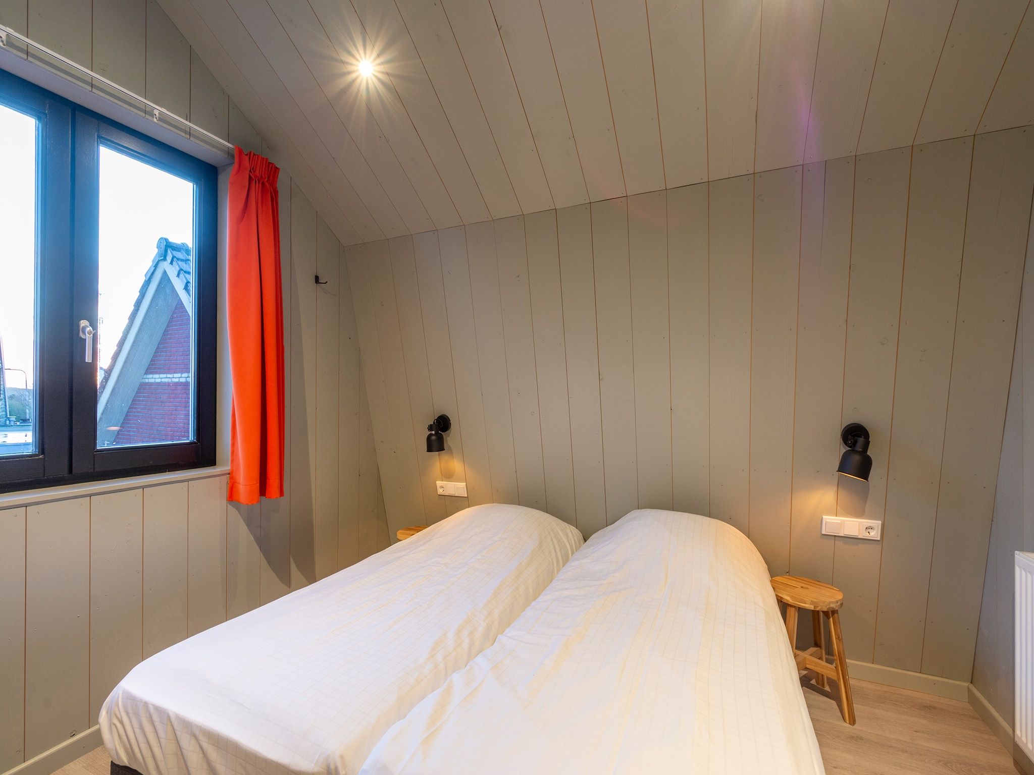 Een slaapkamer van Groote Kaap in Callantsoog