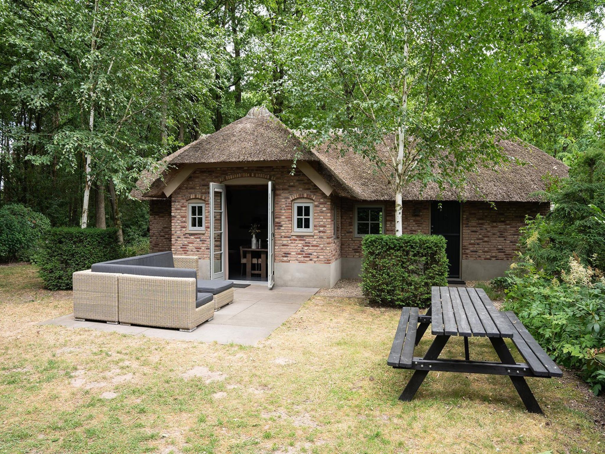 De buitenkant van Vlindervallei Villa 8p in Ermelo