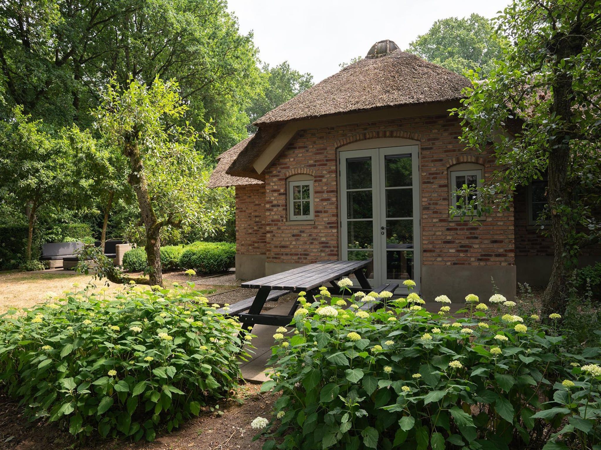 De buitenkant van Vlindervallei Villa 8p in Ermelo