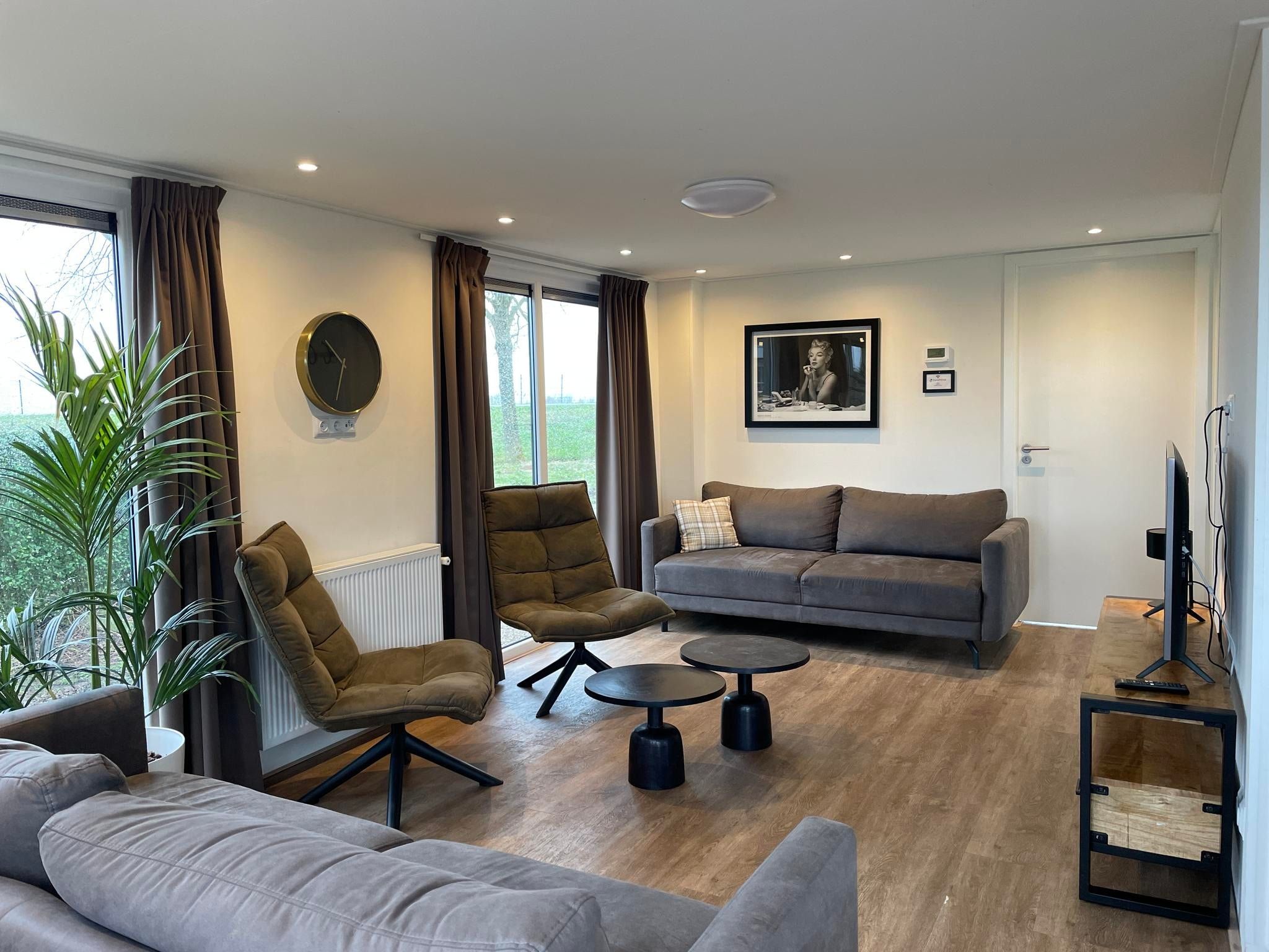 De woonkamer van Molenhof Villa  10 personen in West-Graftdijk