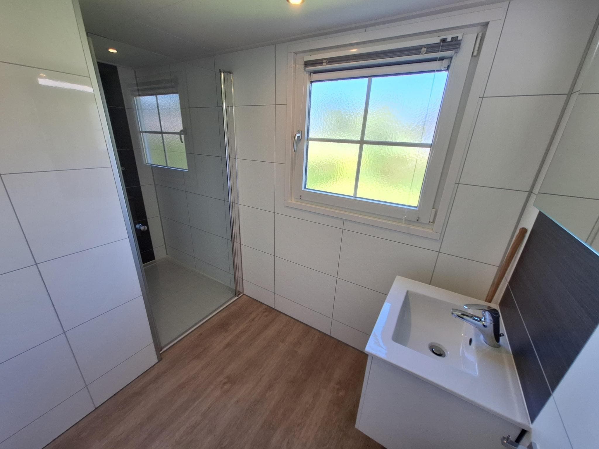 De badkamer van Tulpenhof Villa  10 personen in West-Graftdijk