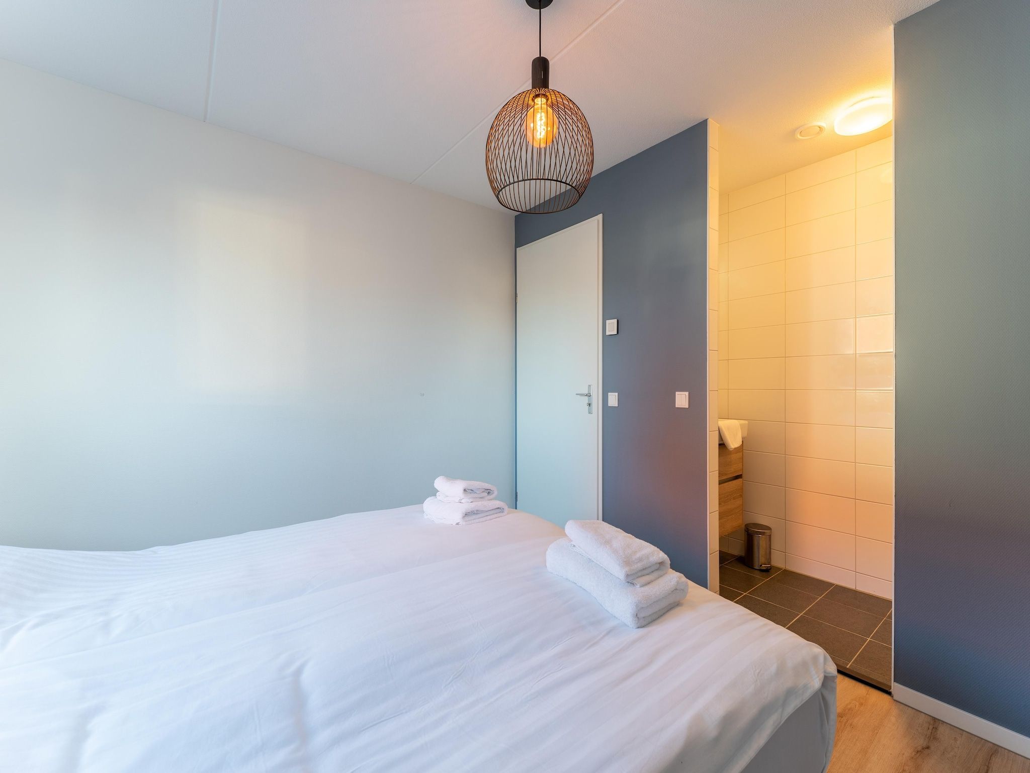 Een slaapkamer van Wulpdal 63 in Scherpenisse