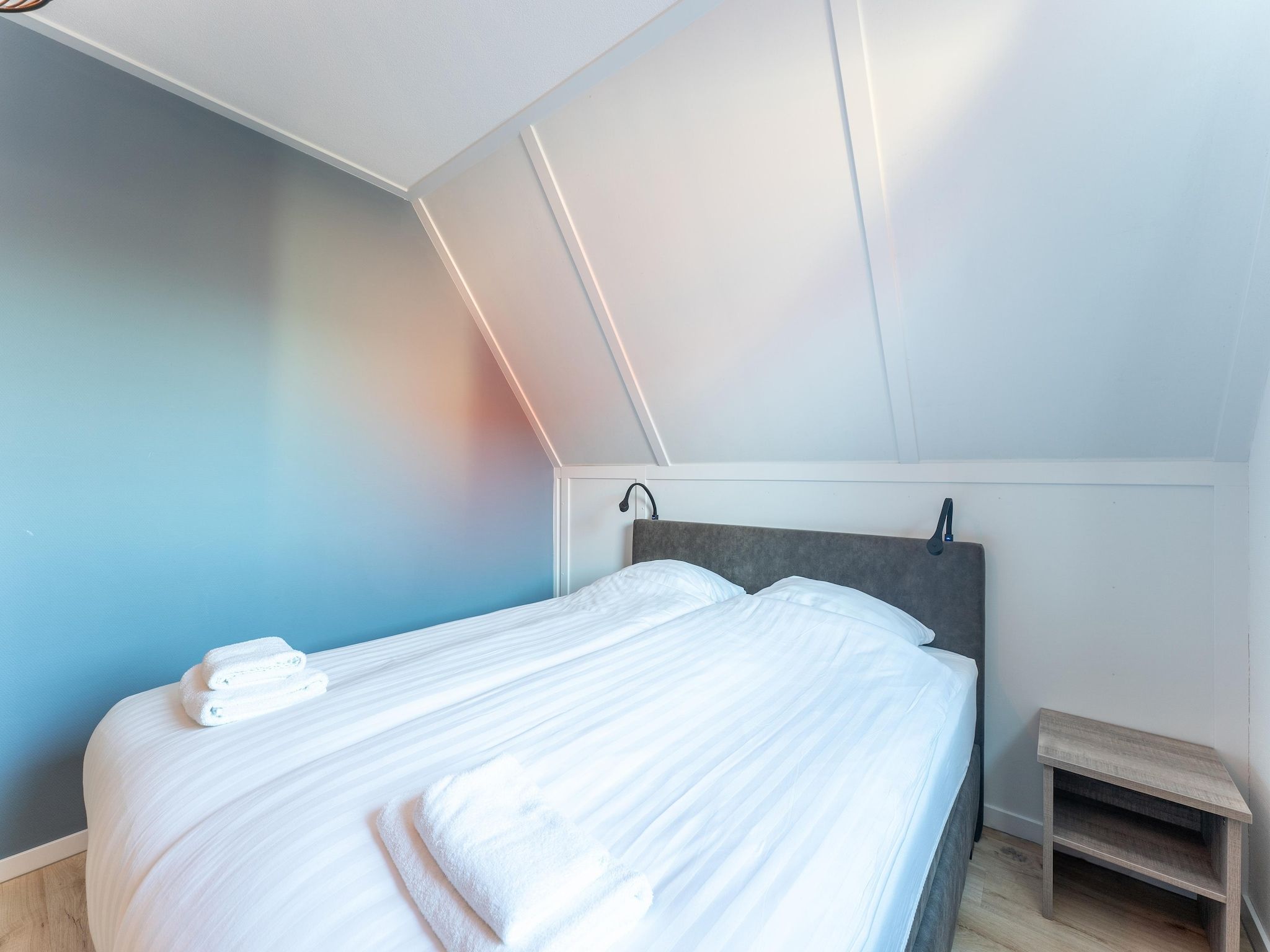 Een slaapkamer van Wulpdal 63 in Scherpenisse