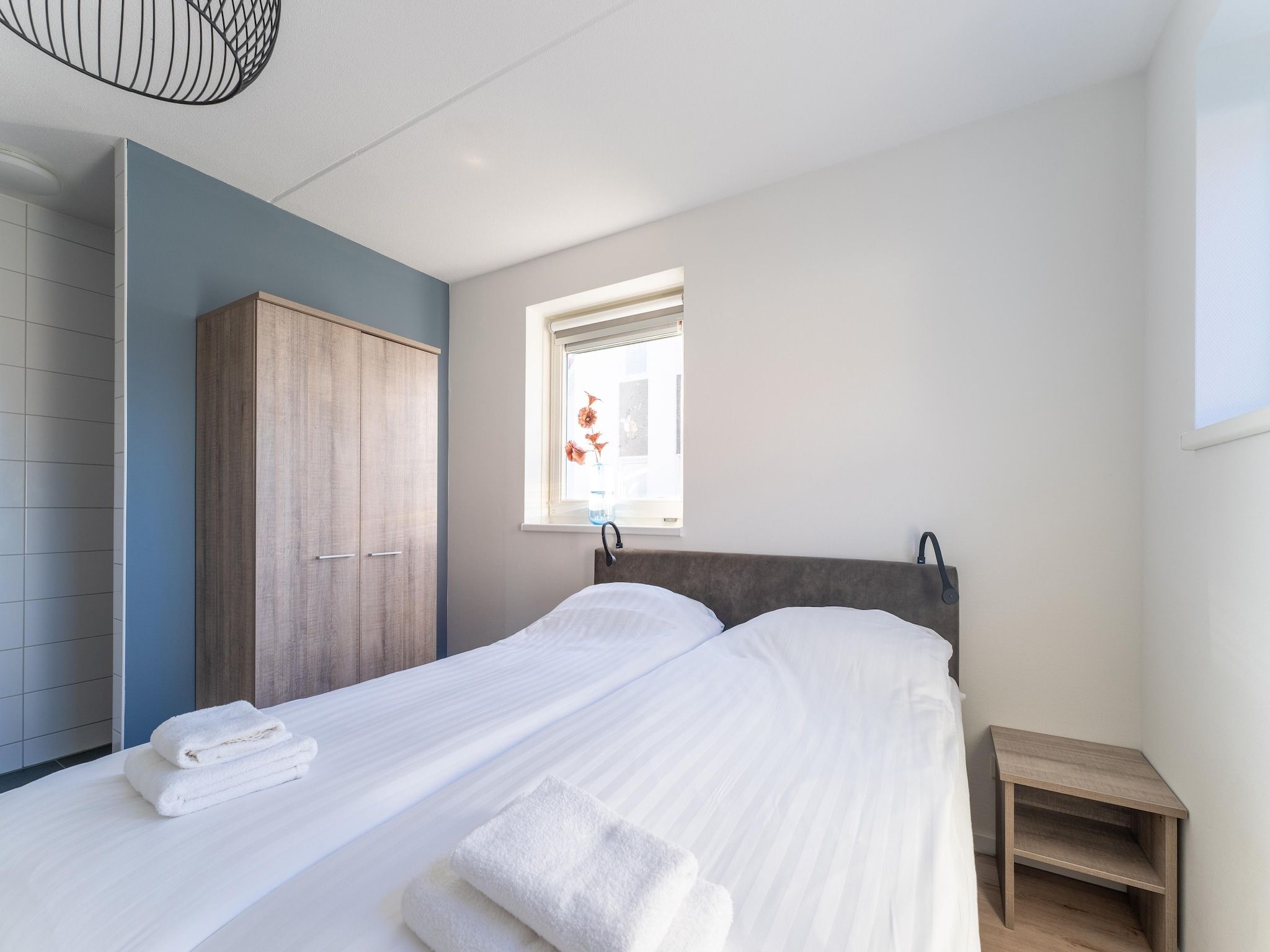 Een slaapkamer van Wulpdal 63 in Scherpenisse