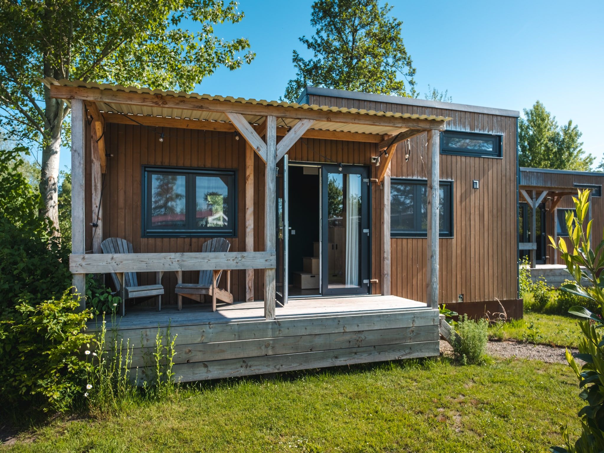 De buitenkant van Groepsaccommodatie voor 20 personen + 5 Tiny Greenhouses voor 2 tot 4 personen in Scherpenzeel (FR)