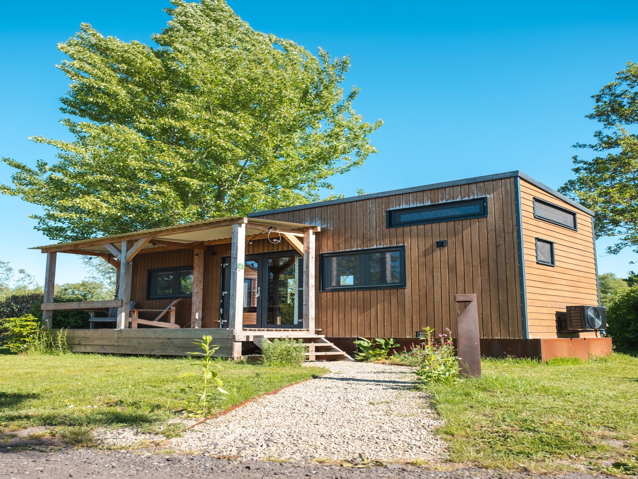 De buitenkant van Groepsruimte i.c.m. 4 tiny greenhouses in Scherpenzeel (FR)