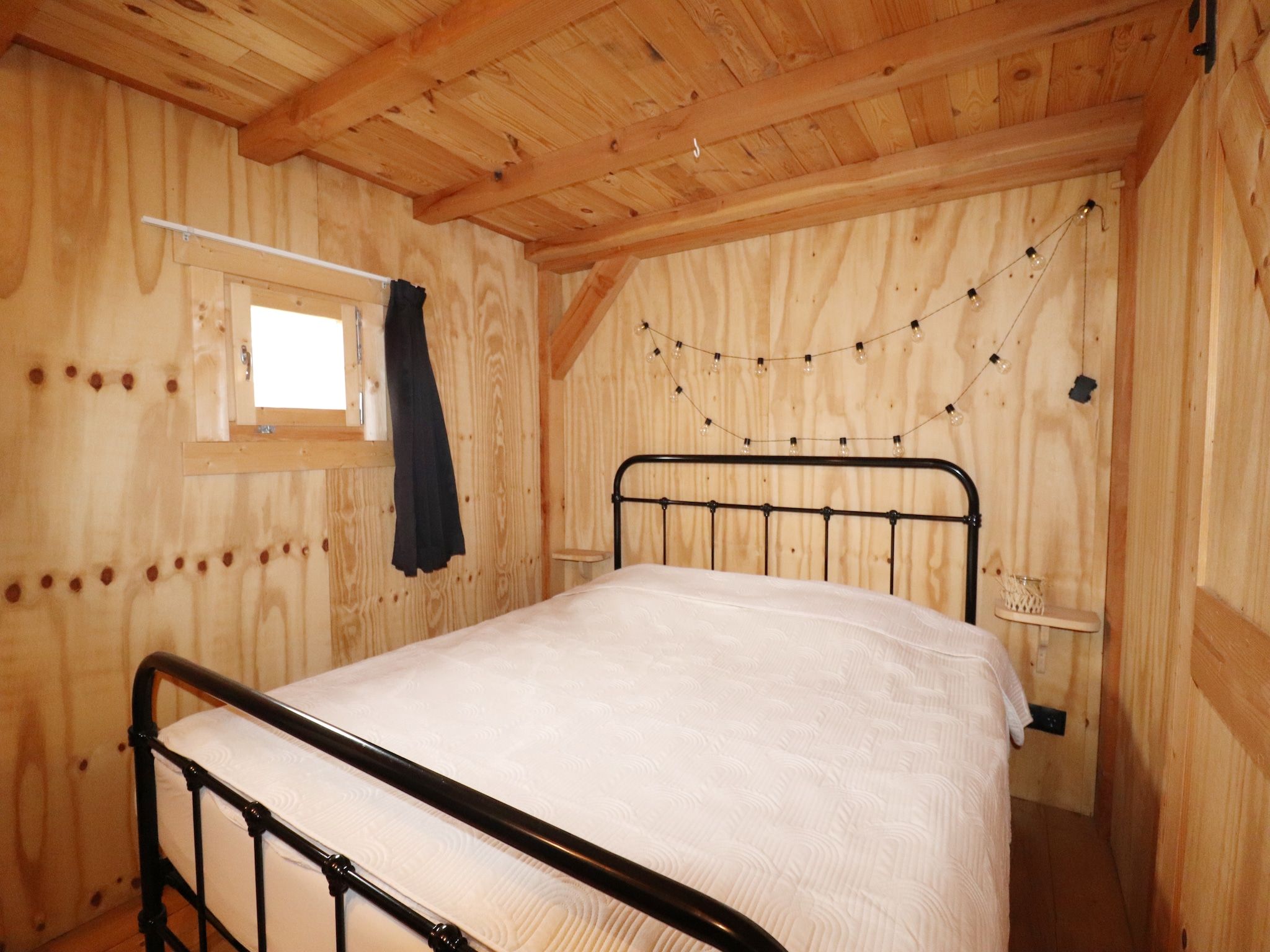 Een slaapkamer van Grutto en Turleluur in Tjerkgaast