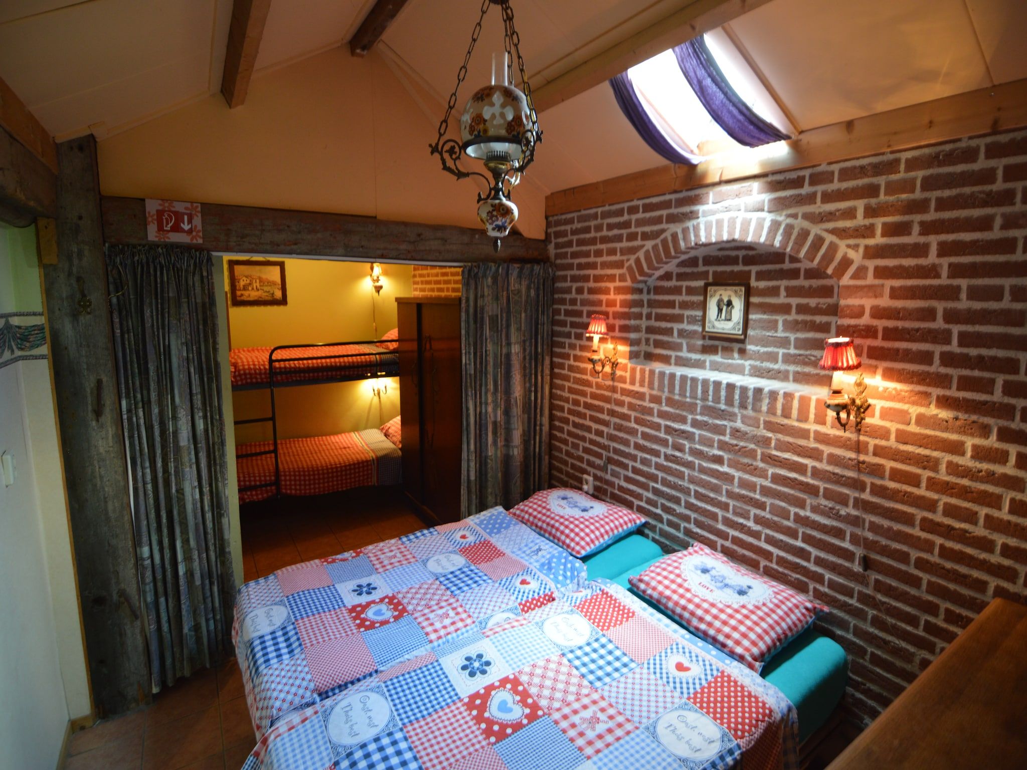 Een slaapkamer van De Herberg in Bergen op Zoom