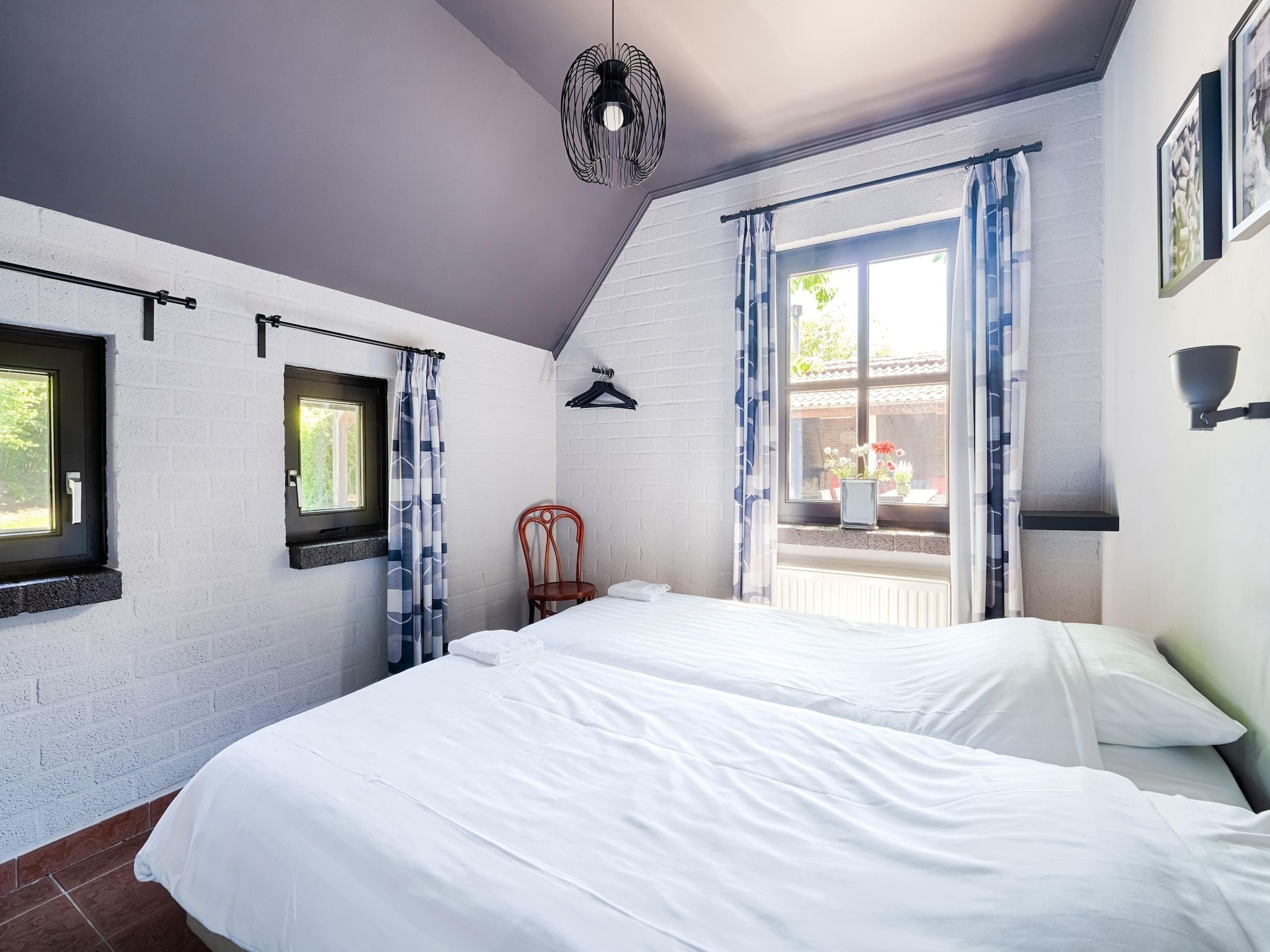 Een slaapkamer van 't Woold in Asten