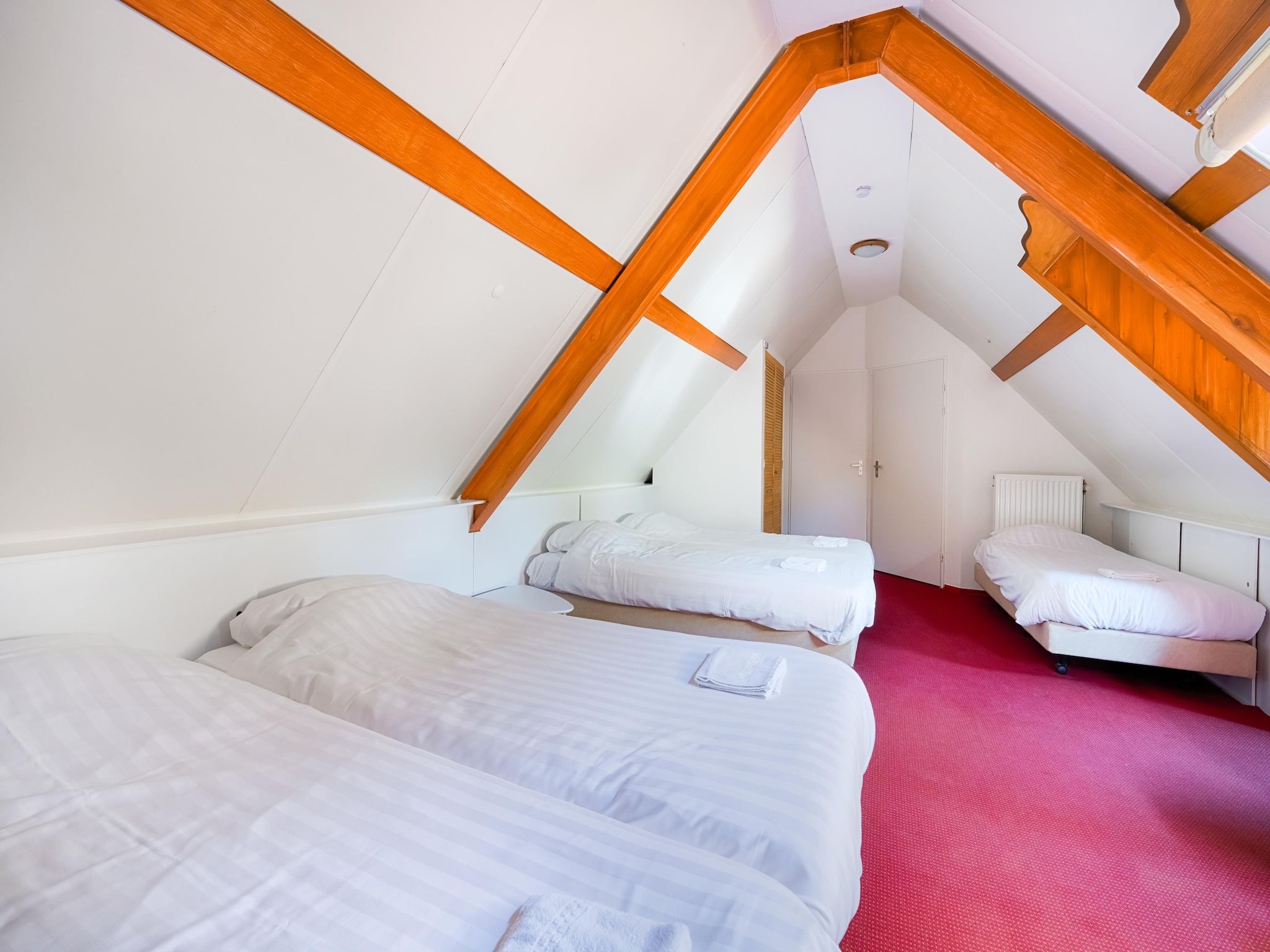 Een slaapkamer van 't Woold in Asten