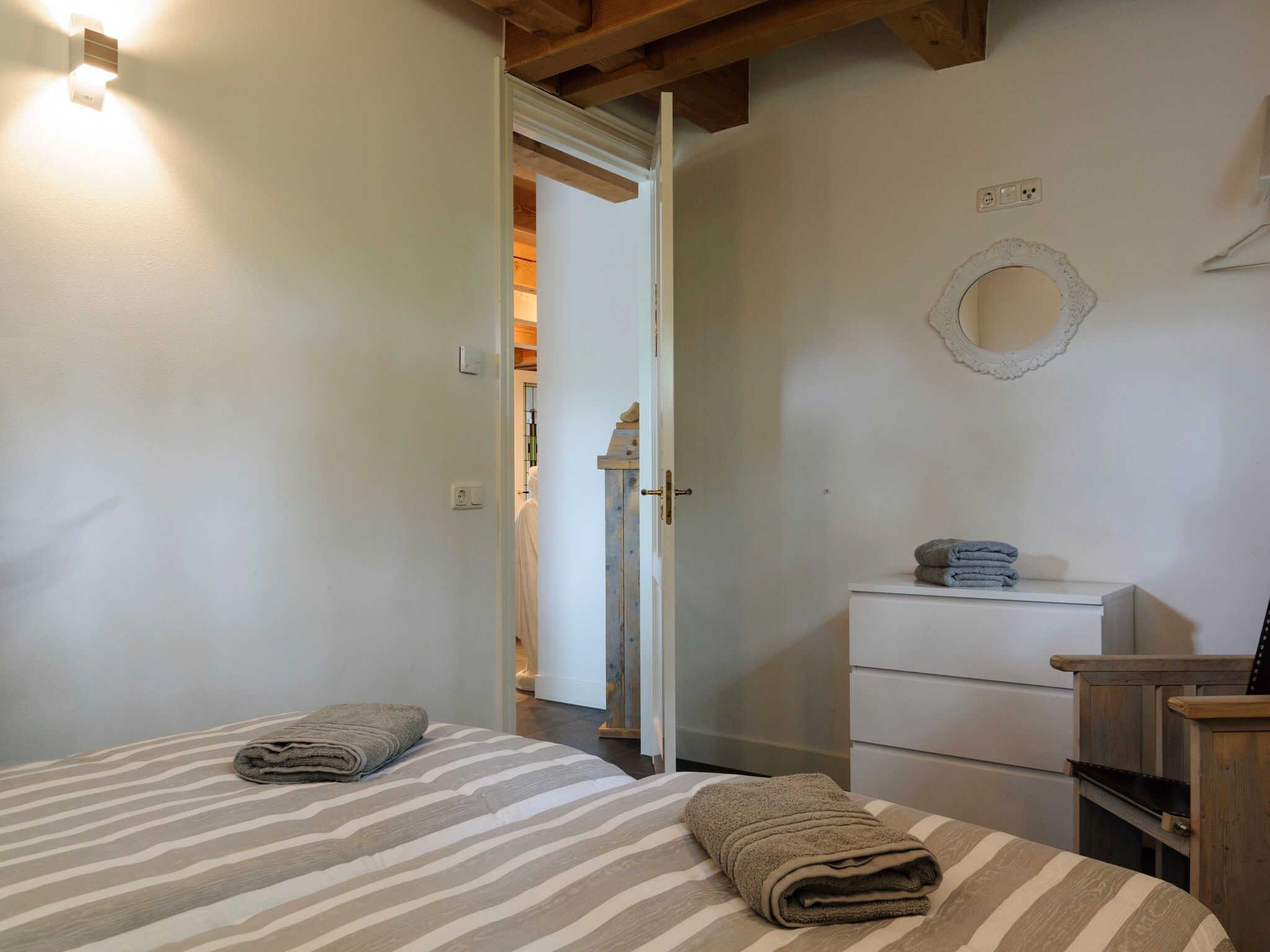 Een slaapkamer van Groepsaccomodatie - Balkenhoeve in Schagen