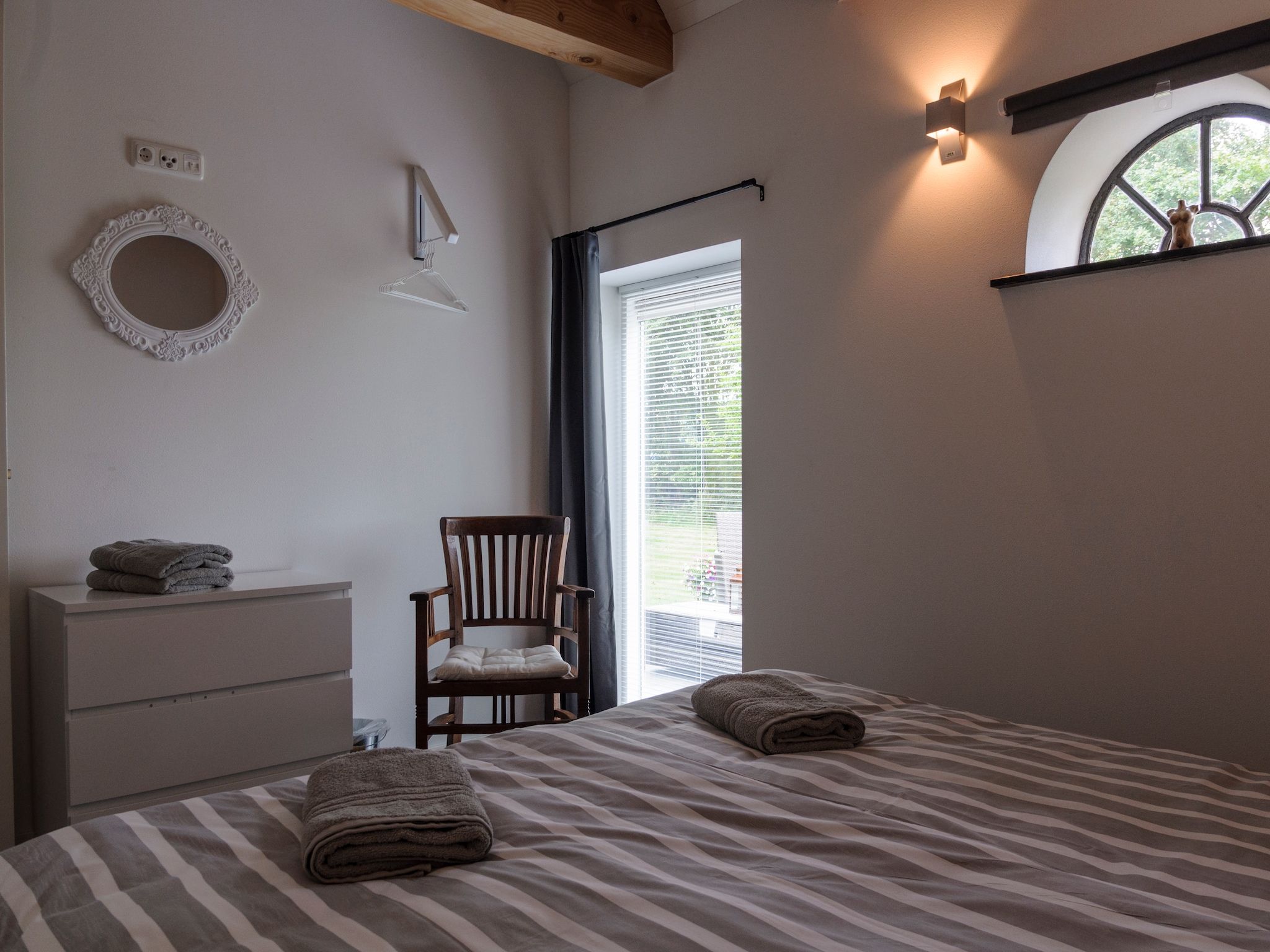 Een slaapkamer van Groepsaccomodatie - Balkenhoeve in Schagen